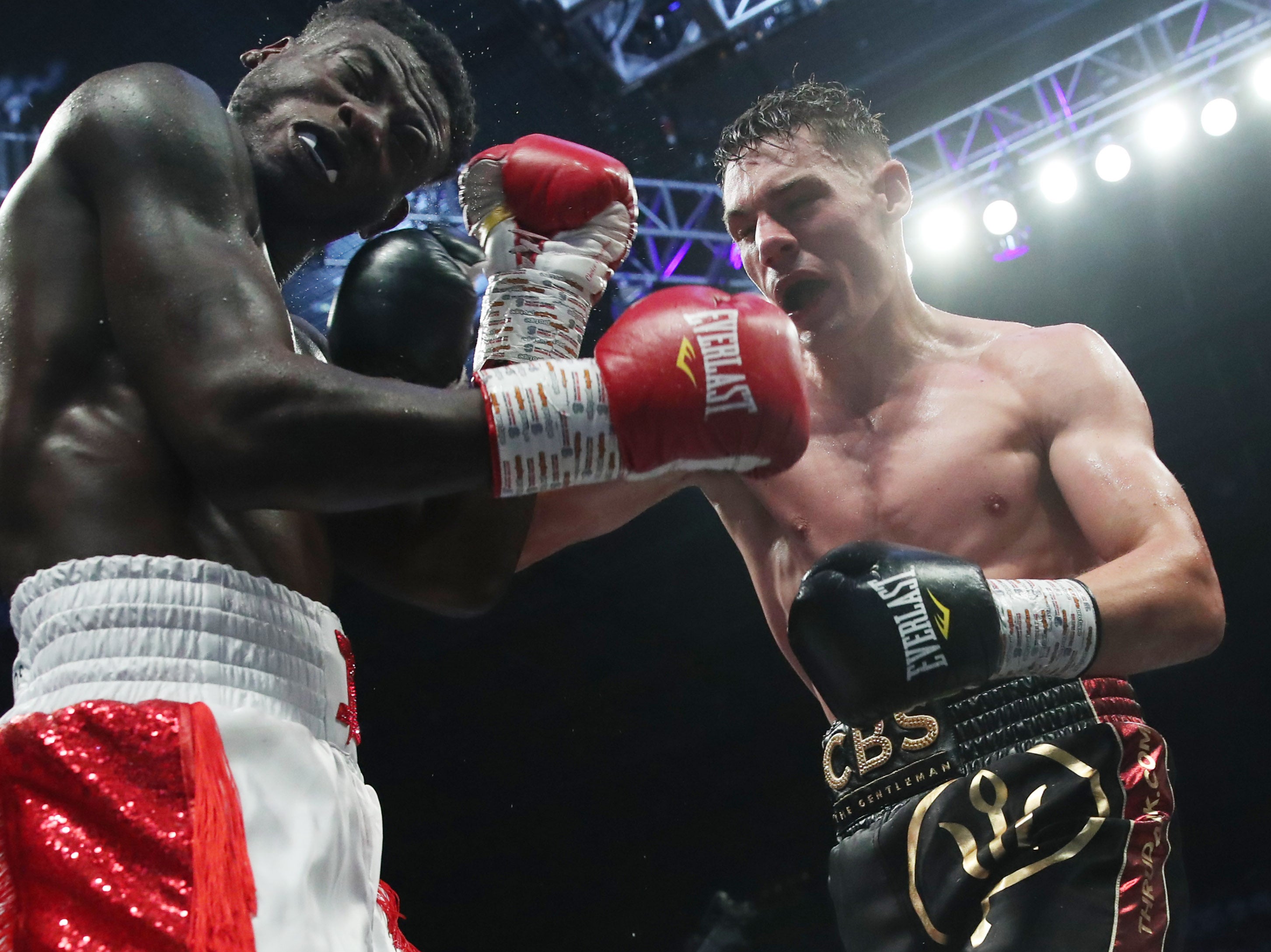 Chris Billam-Smith (right) outpointed Isaac Chamberlain to retain the European and Commonwealth cruiserweight titles