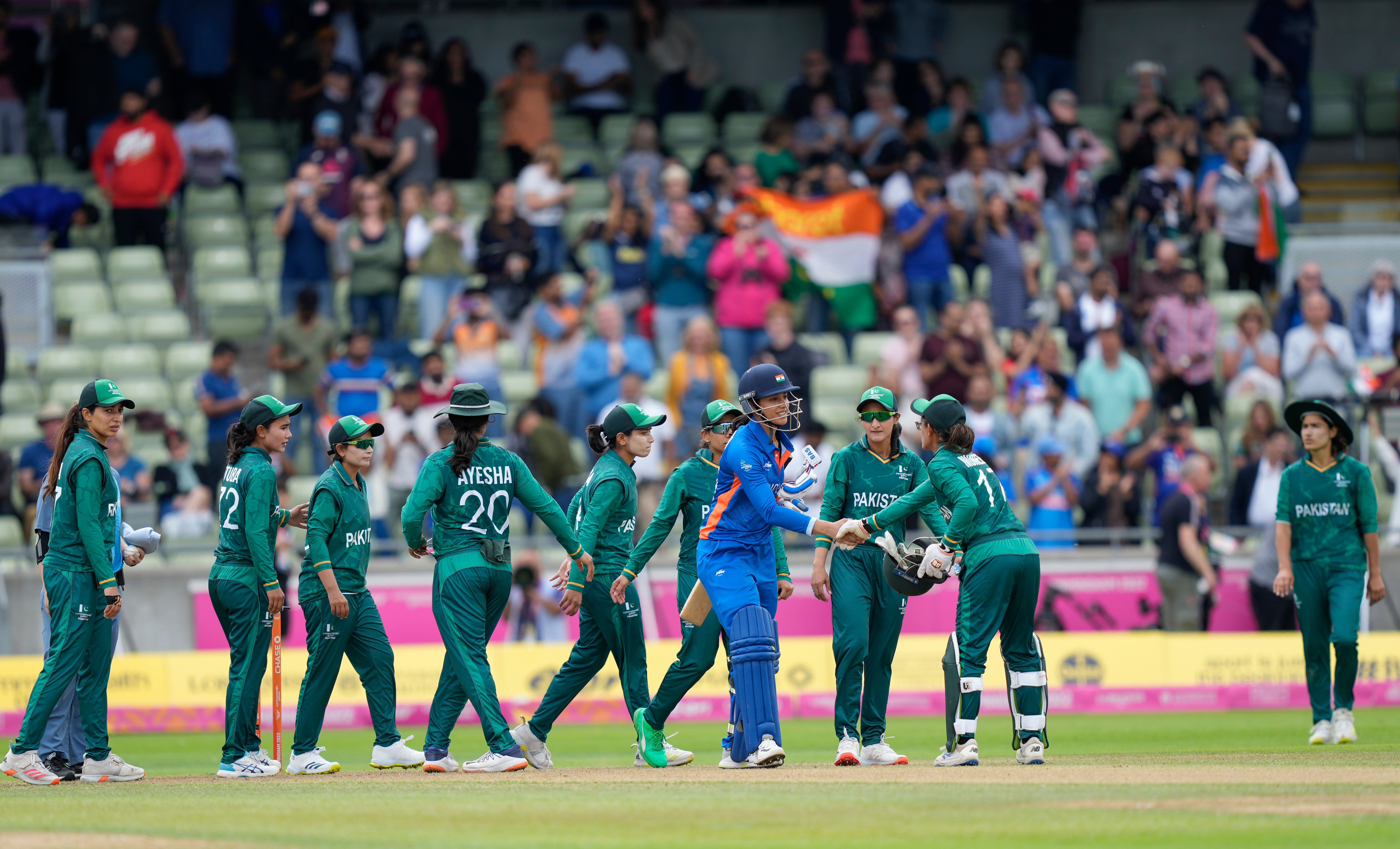 India’s Smriti Mandhana shakes hands with Pakistan players