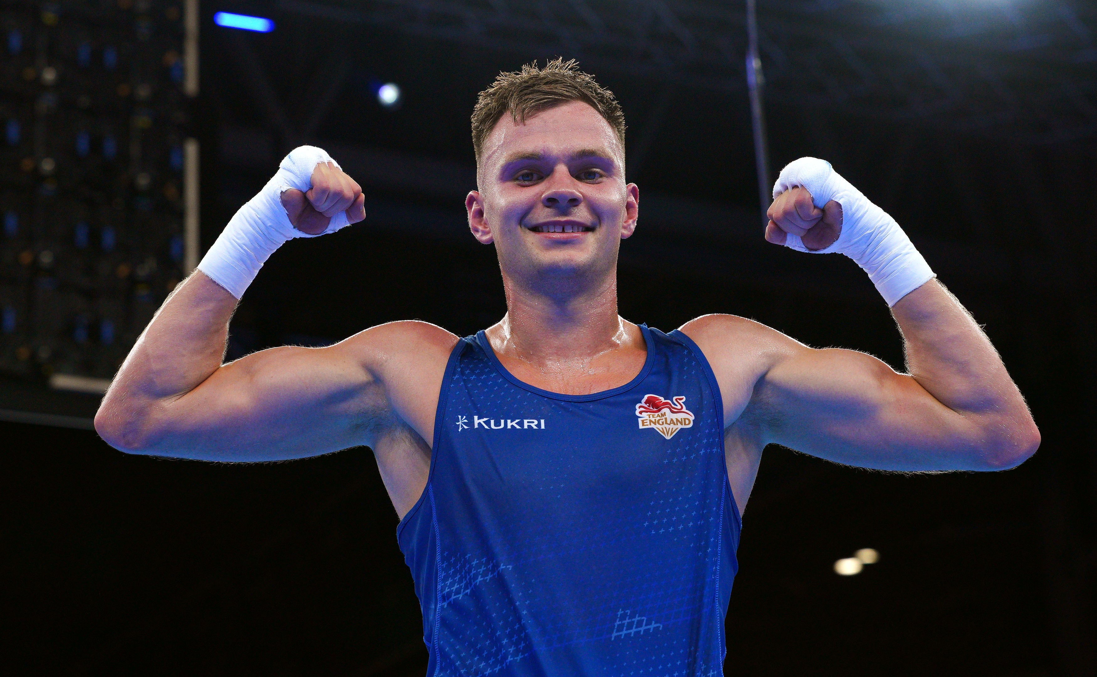 England’s Lewis Richardson (Blue) celebrates victory against Uganda’s Yusuf Nikobeza