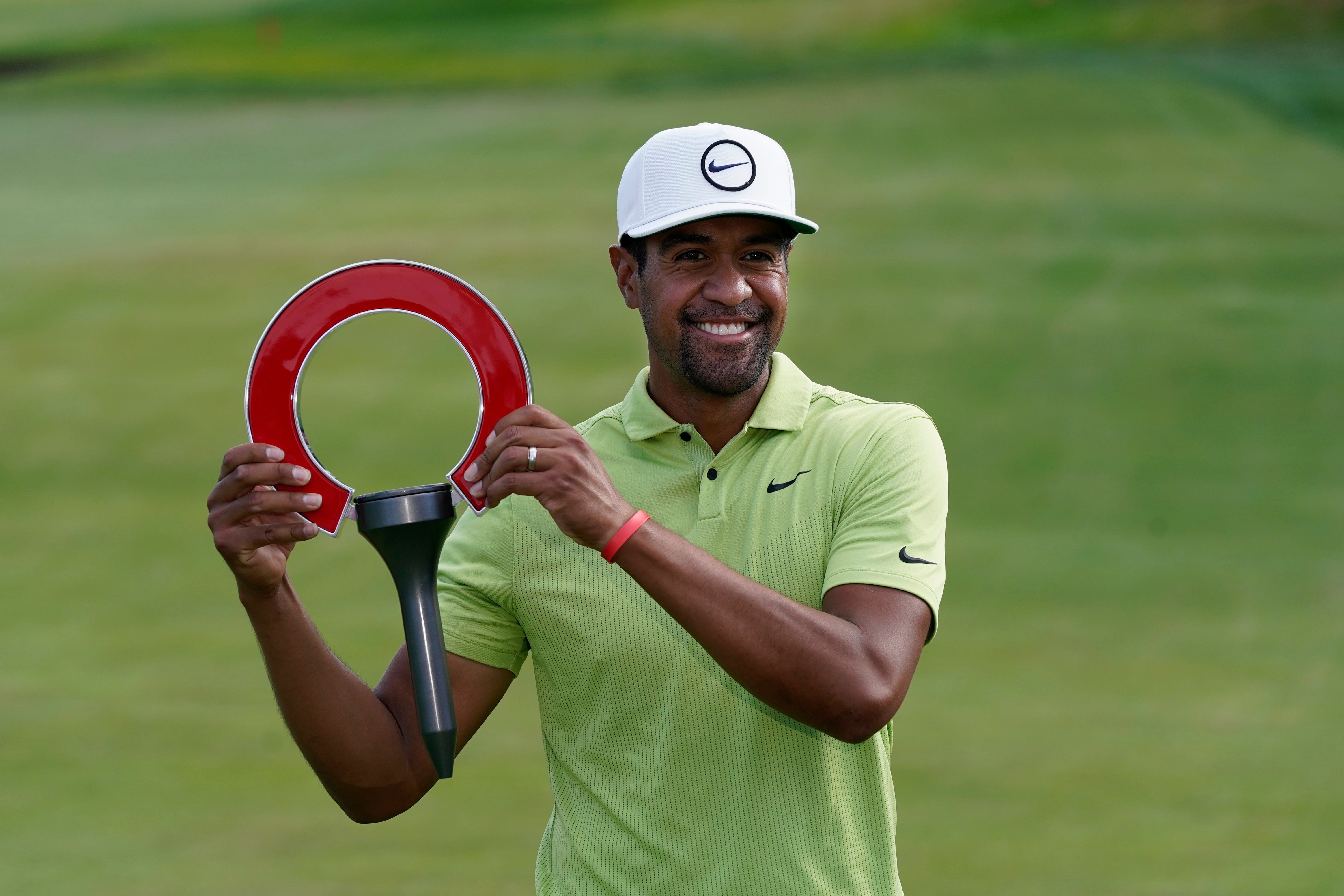 Tony Finau ran away with victory on Sunday to clinch back-to-back tour titles with a five-stroke win at the Rocket Mortgage Classic (Carlos Osorio/AP)