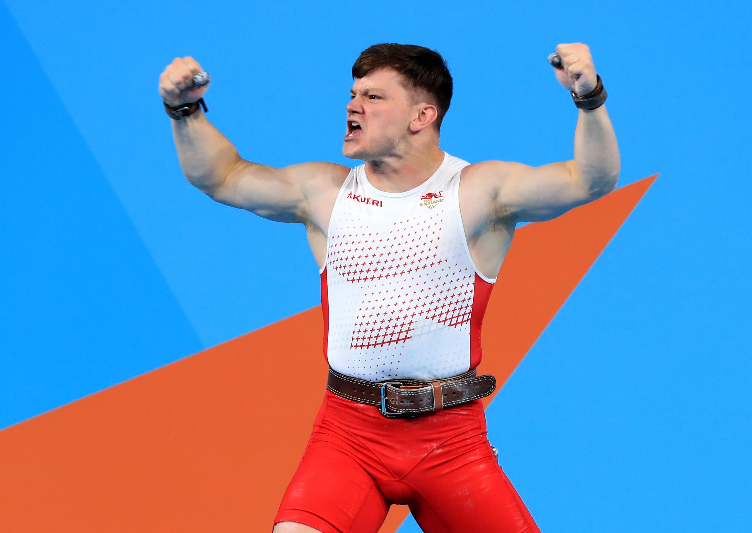 Chris Murray reacts after a successful lift in the men’s 81kg weightlifting competition (Bradley Collyer/PA)