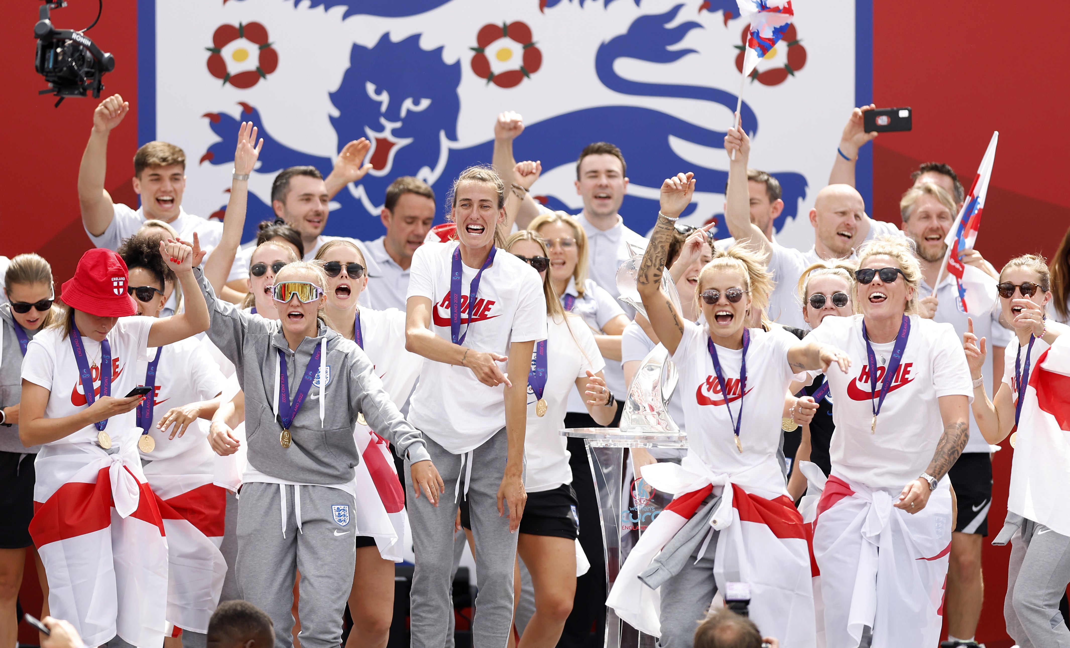 England players sing Sweet Caroline on stage during a fan celebration to commemorate their Euro 2022 triumph (Steven Paston/PA)