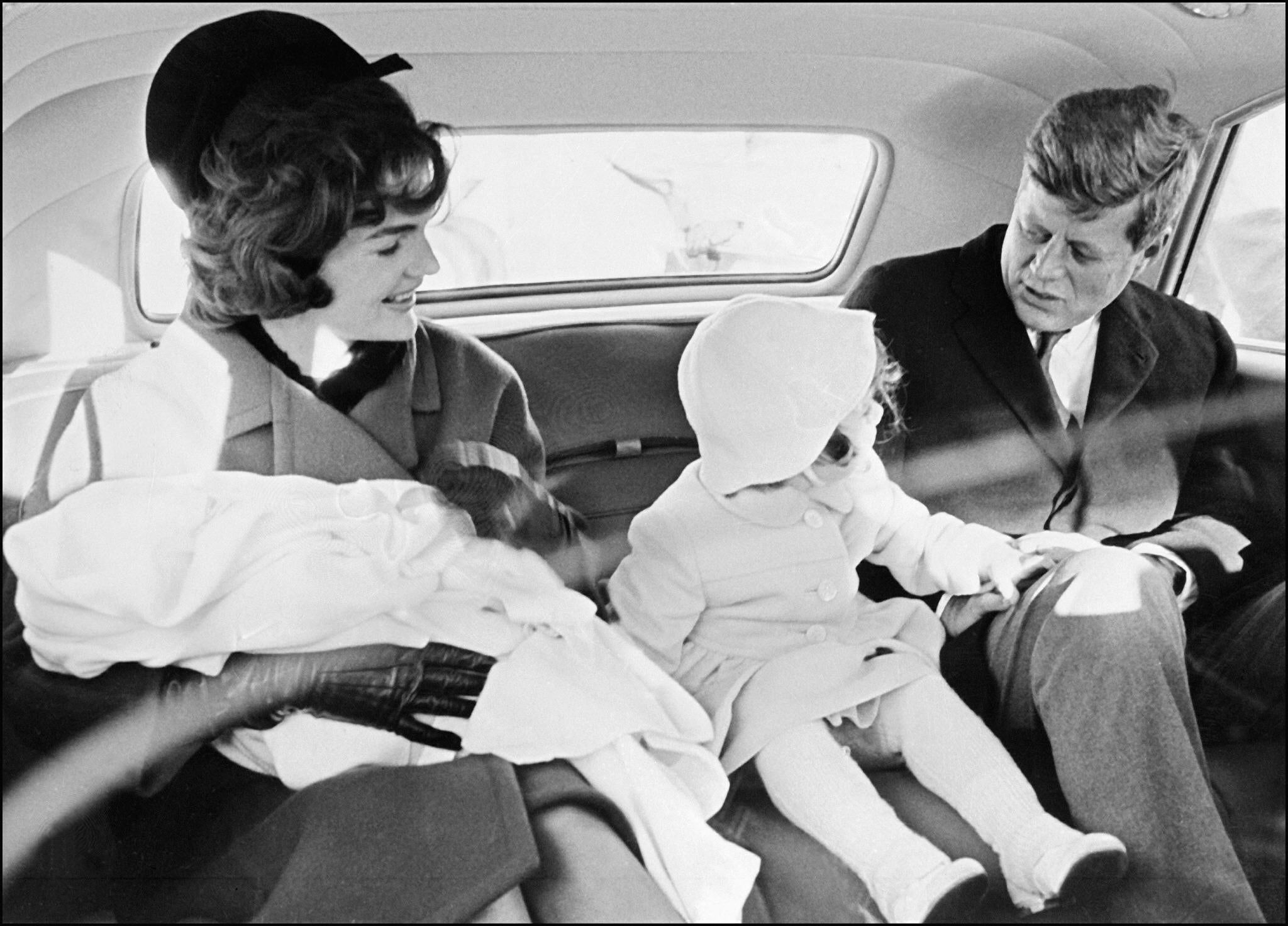 A young Caroline Kennedy (centre) with Jackie and JFK