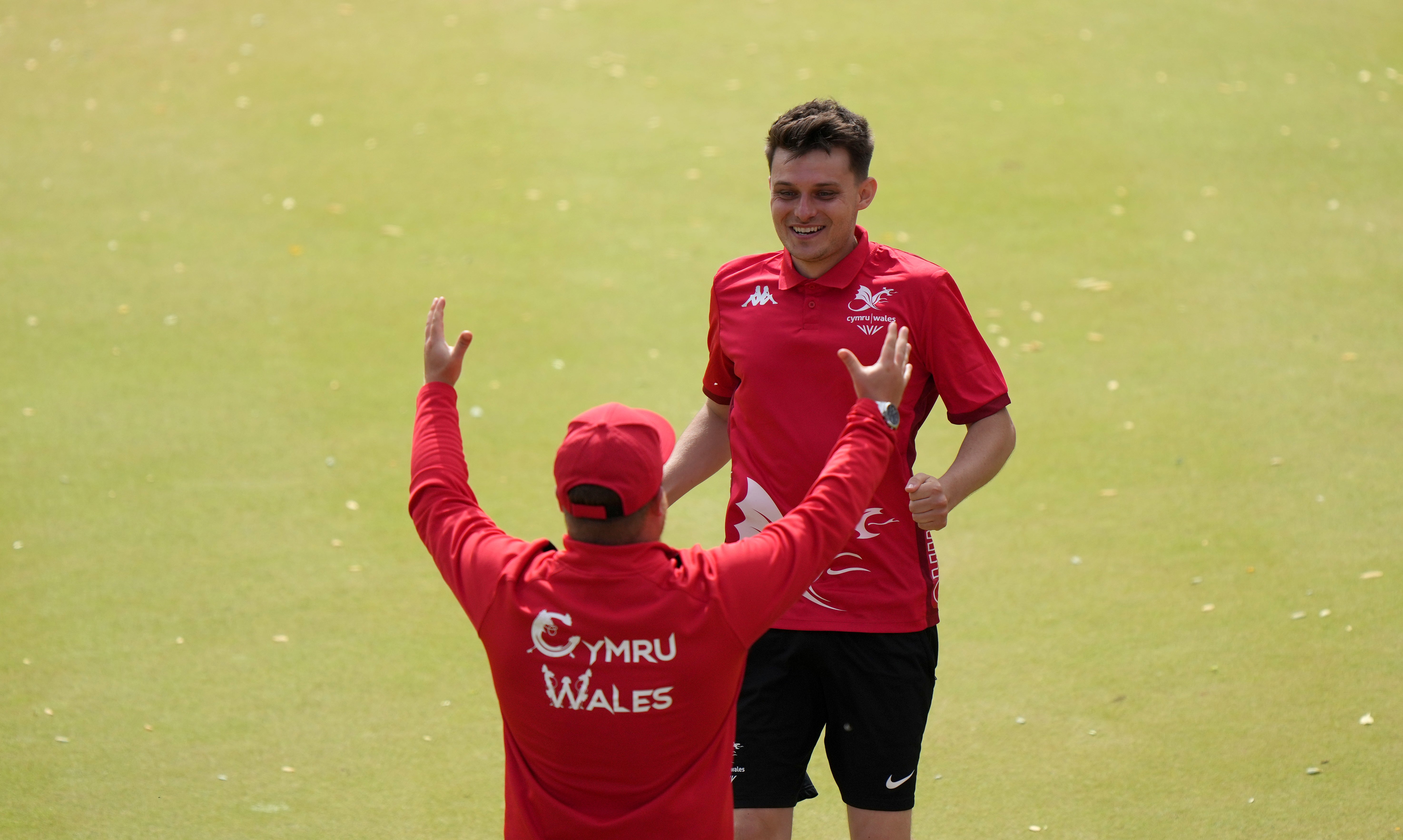 Wales bowlers Jarrad Breen, right, and Daniel Salmon celebrate after winning the Commonwealth Games men’s pairs final at Birmingham 2022 (Tim Goode/PA)