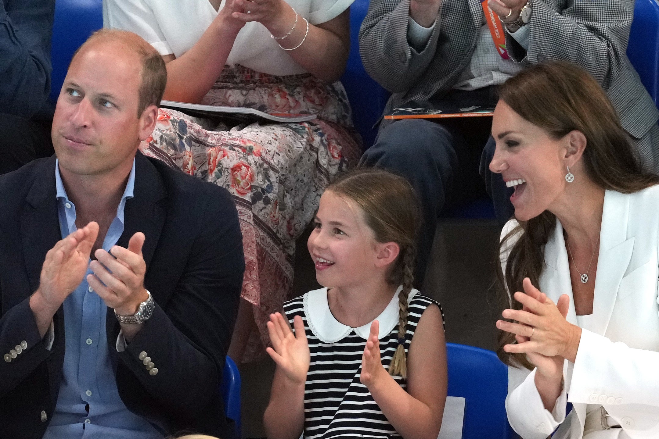 The family enjoy the swimming (Jacob King/PA)