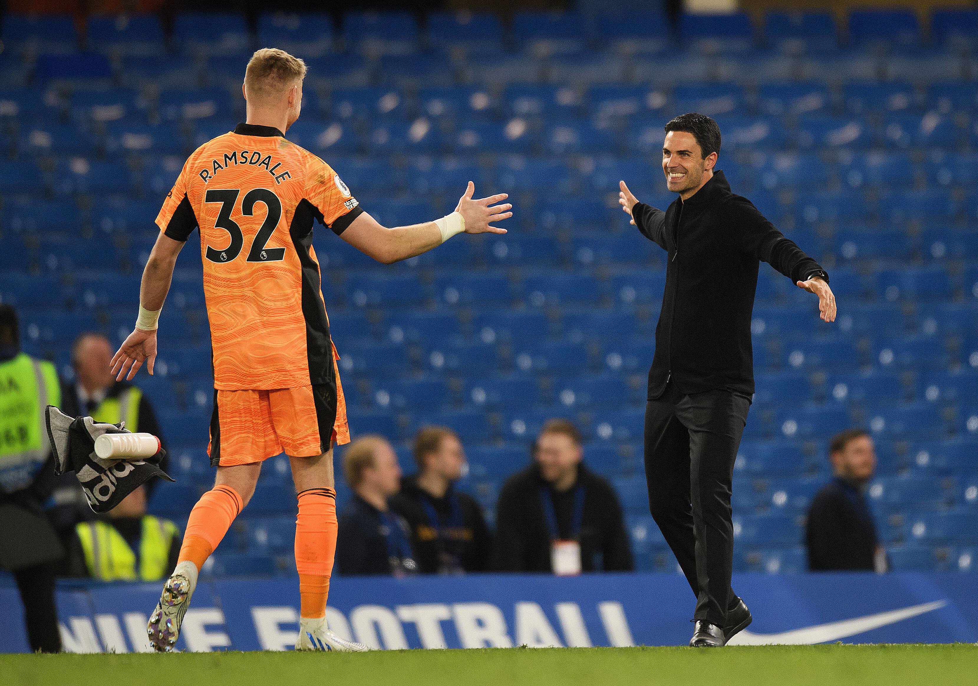 Mikel Arteta celebrates victory with Aaron Ramsdale after the win at Chelsea. (Mark Pain/Alamy)