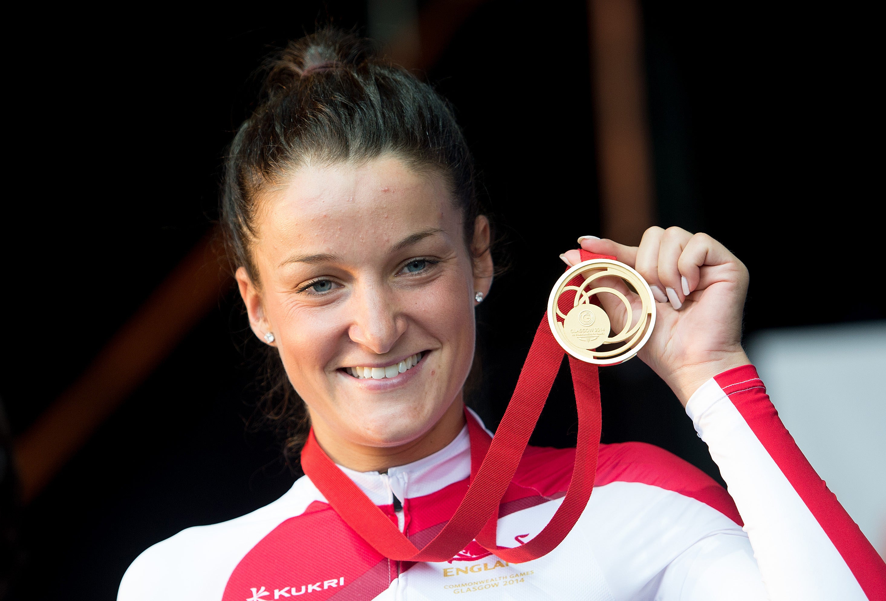 England’s Lizzie Armitstead – now Deignan – celebrates gold in the road race (Tim Ireland/PA)