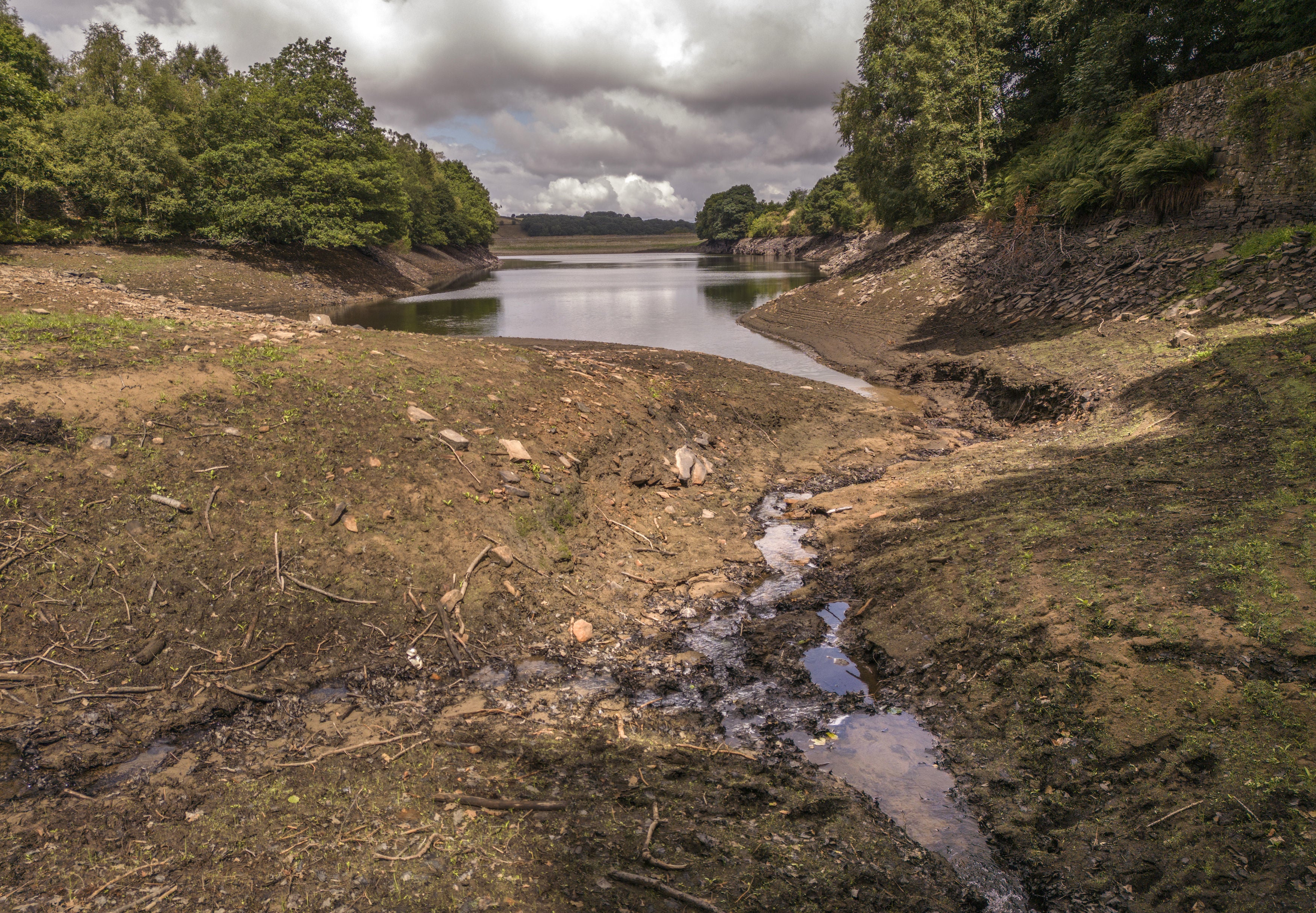 Low water levels at Holme Styes reservoir in Holmfirth West Yorkshire