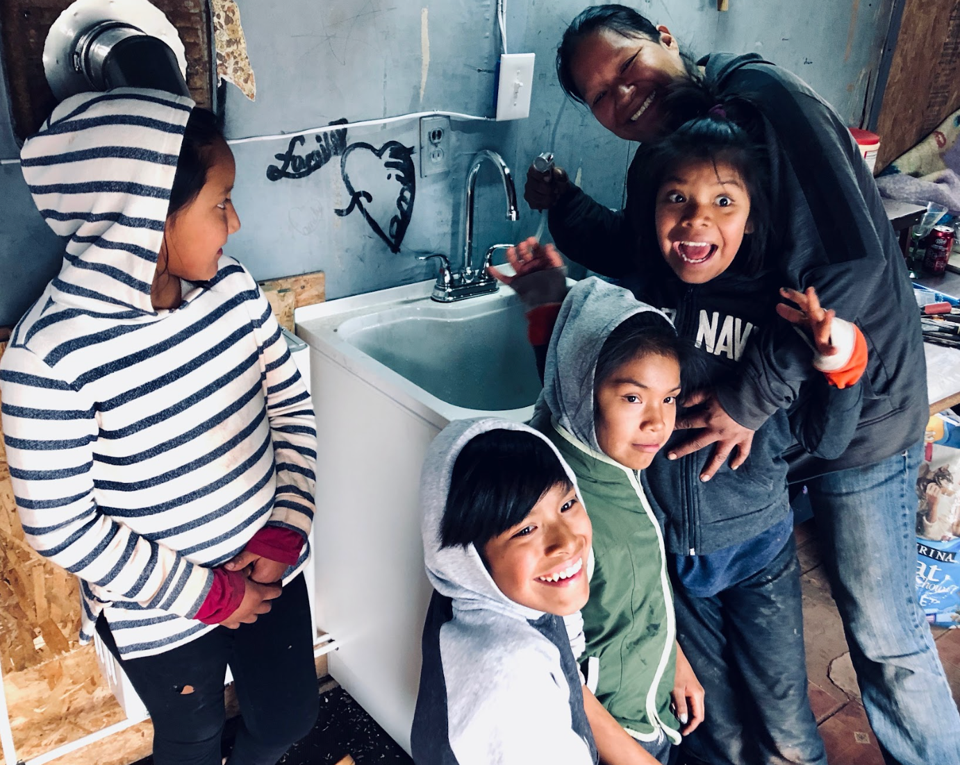 A family on the Navajo Nation celebrate their new water supply