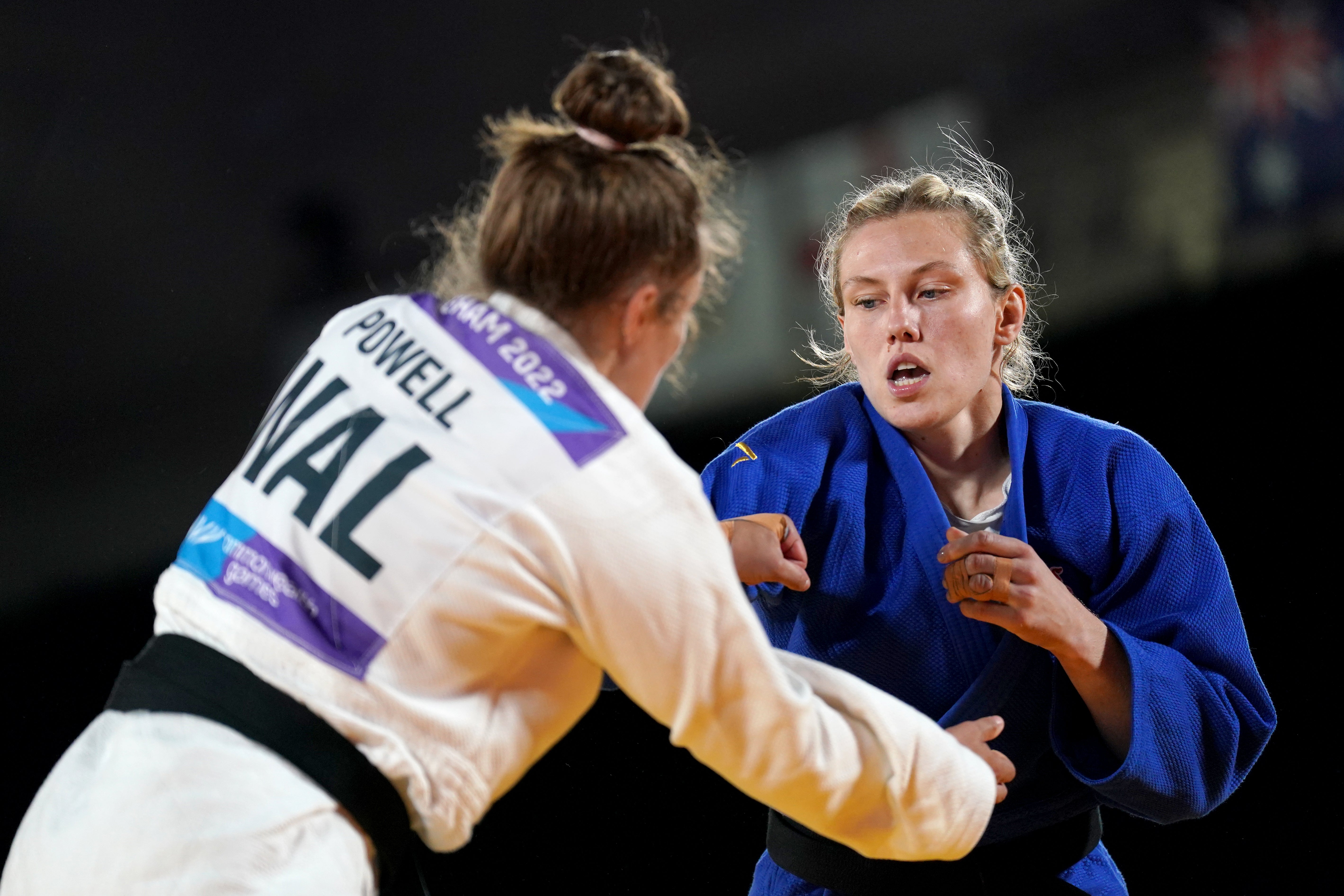 England’s Emma Reid (blue) in action against Wales’ Natalie Powell in the women’s judo -78kg final at the 2022 Commonwealth Games (Joe Giddens/PA)