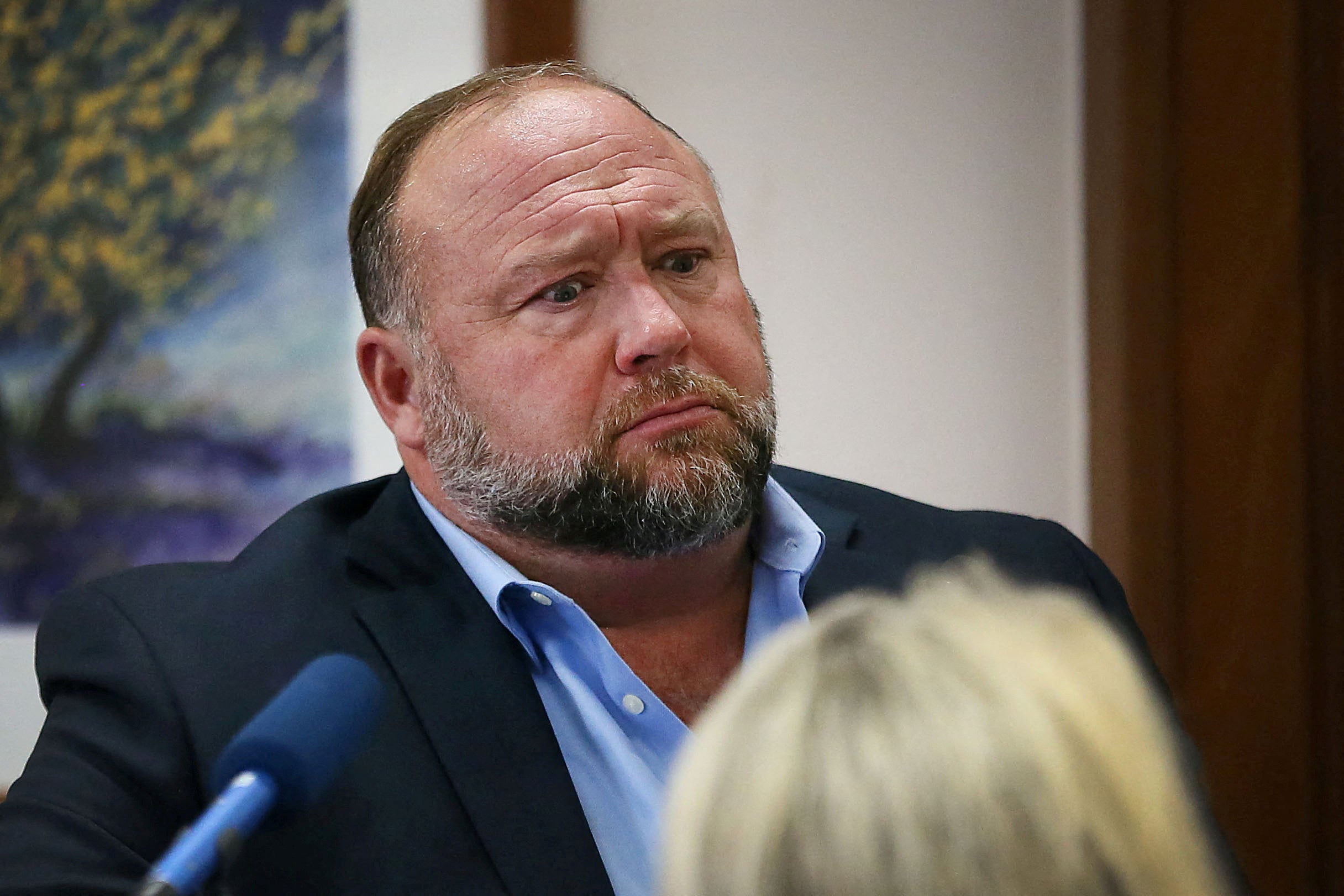 Alex Jones during cross examination at his trial in Texas in August