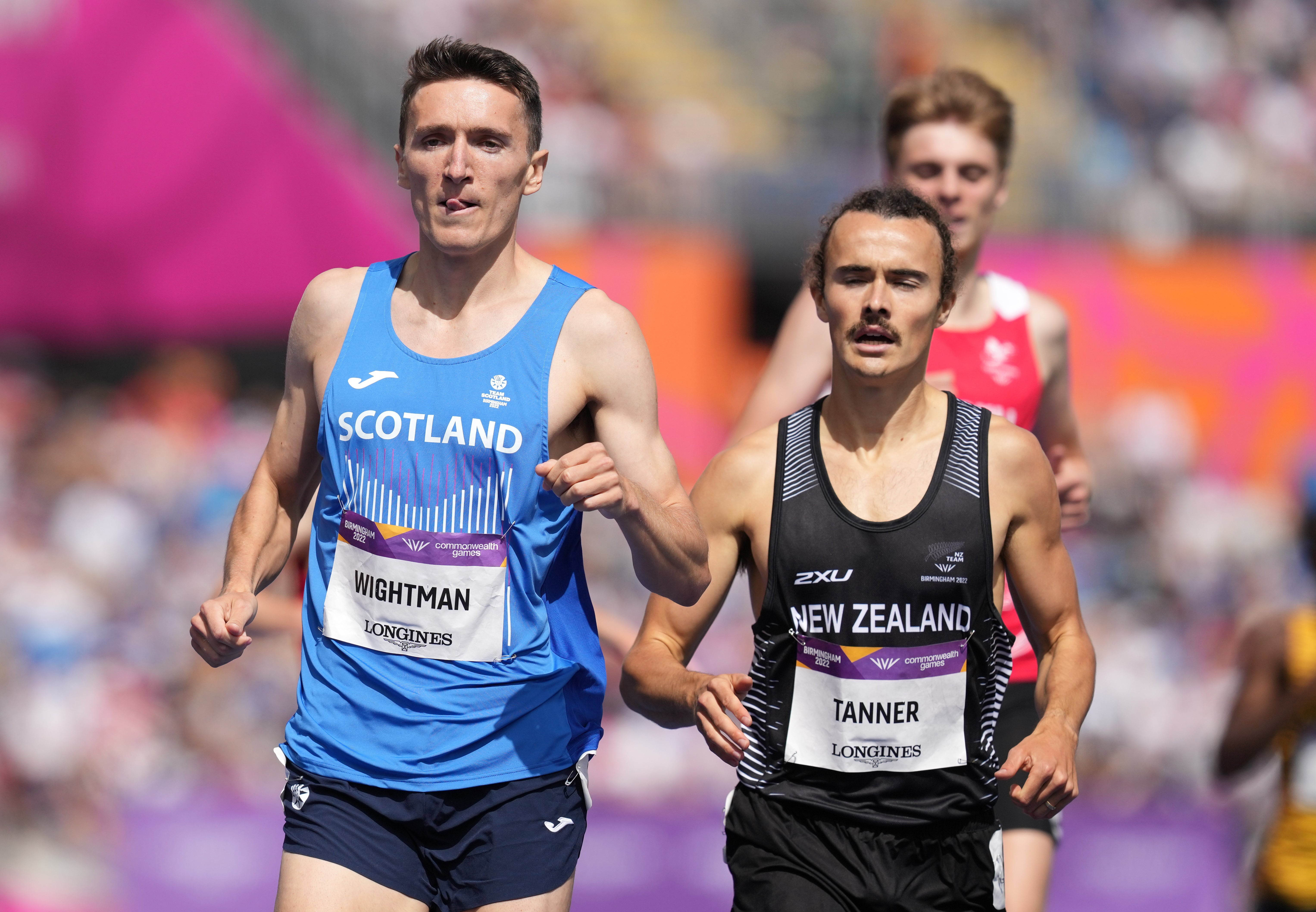 Jake Wightman (left) eased through his 1500m heat (Martin Rickett/PA)