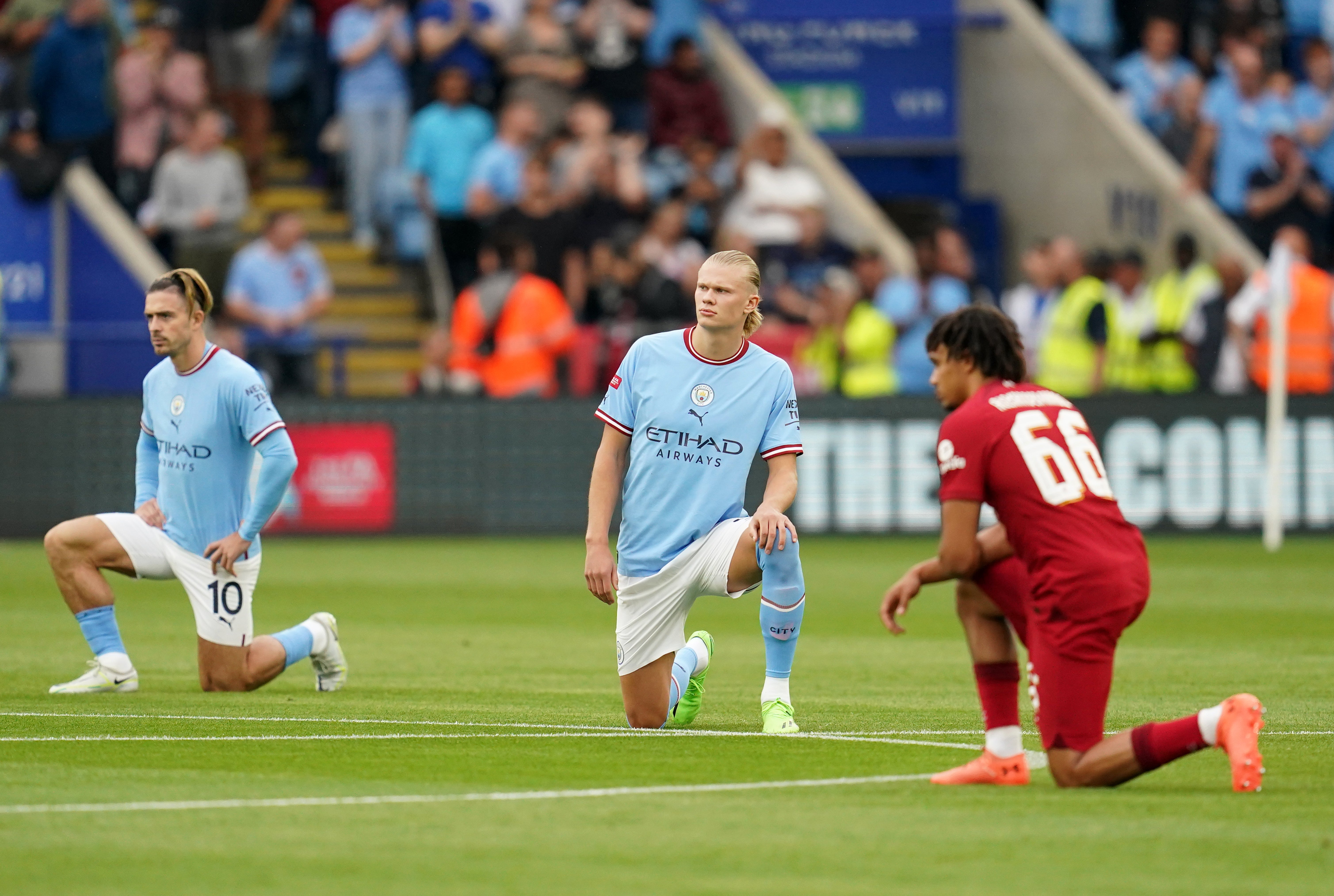 Players taking the knee at Saturday’s match (Nick Potts/PA).