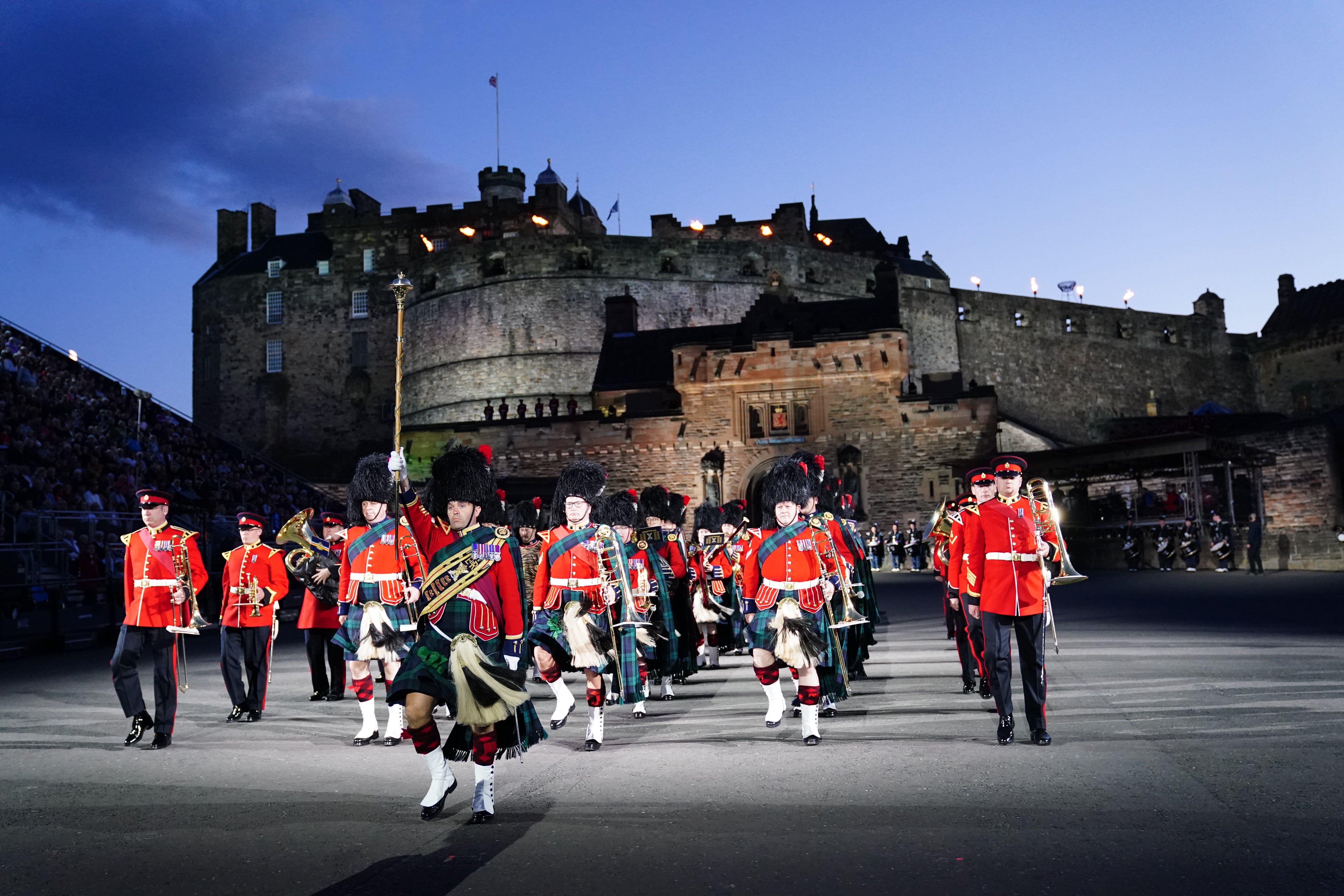 The Royal Edinburgh Military Tattoo is back with a bang as it welcomes back fans for the first time in three years (Jane Barlow/PA)