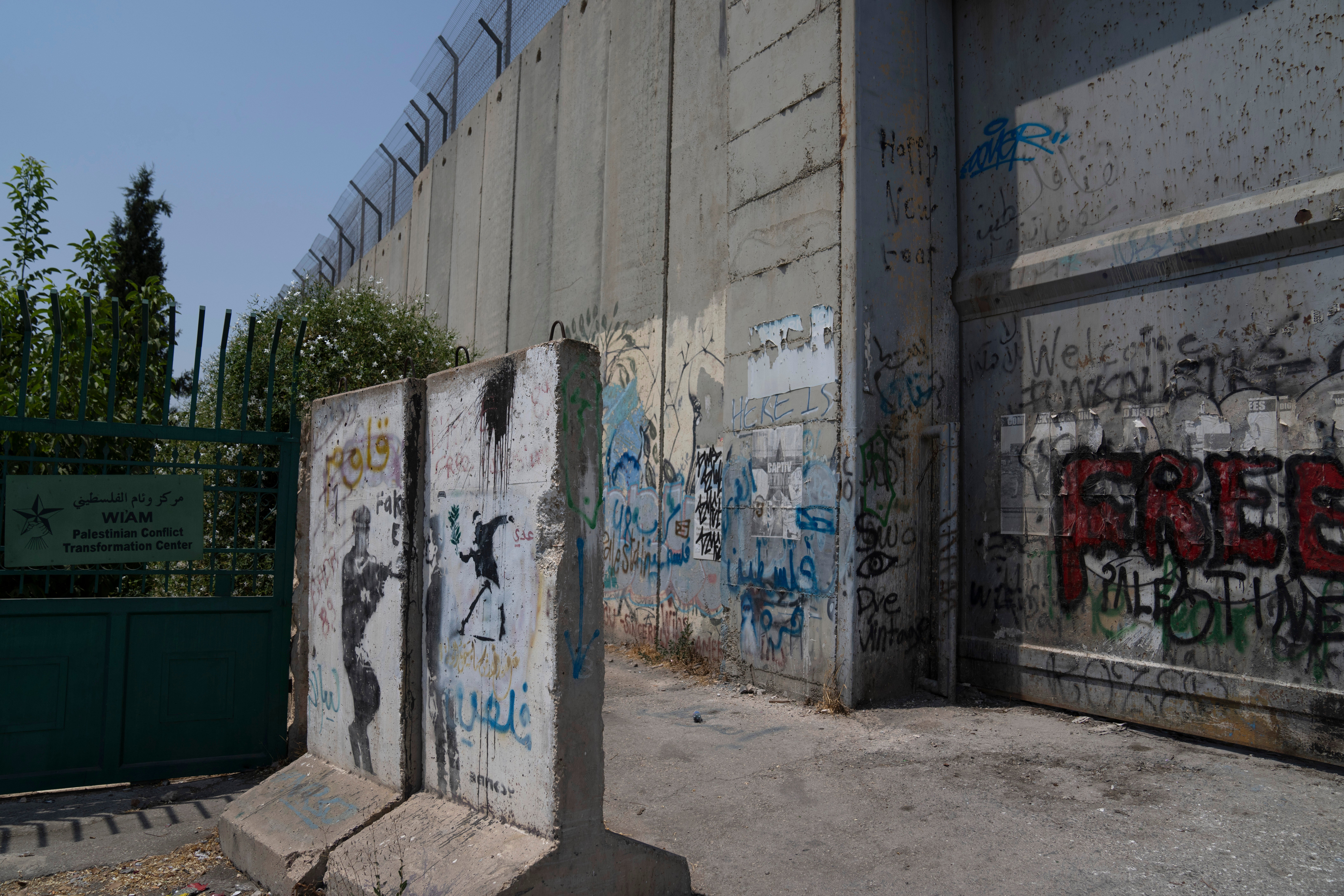 Israel Palestinians Banksy Graffiti