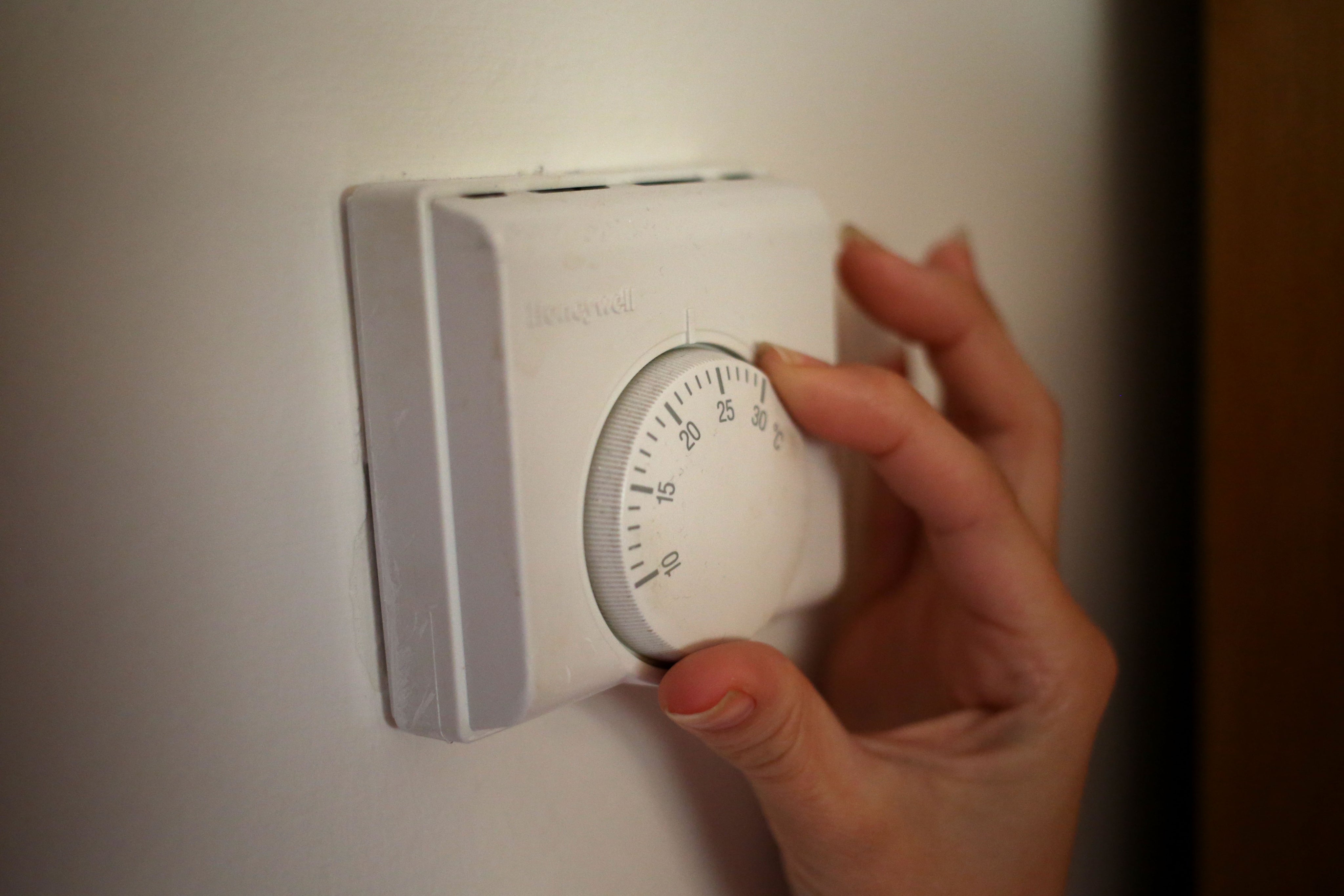 More than half of the population used less energy in their home and cut back on non-essential spending to save money in the spring (Steve Parsons/PA)