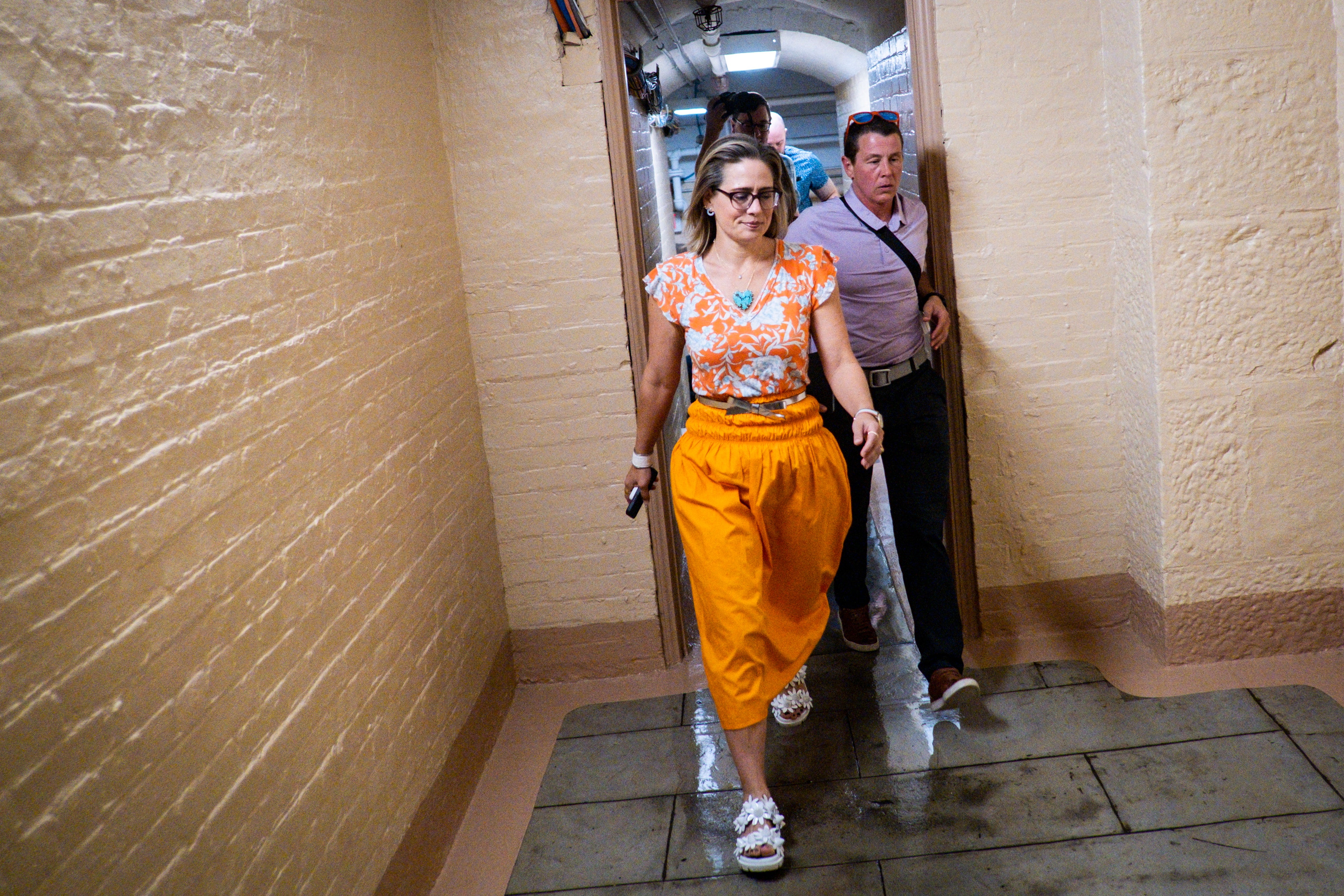 Democratic Senator Kyrsten Sinema makes her way to the Senate floor on 4th August, 2022