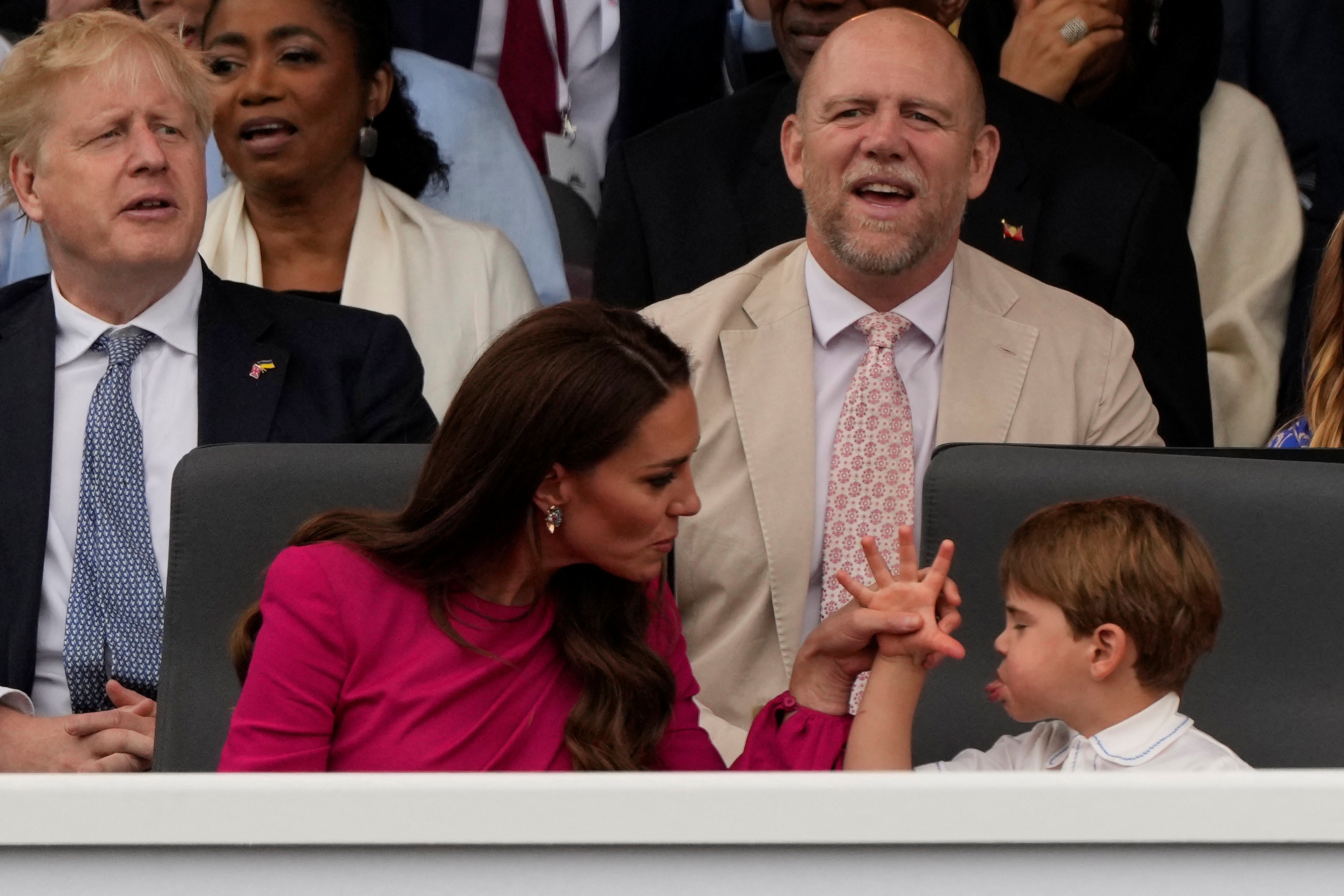 Prince Louis pulls a silly face at his mother, the Duchess of Cambridge, at the Platinum Jubilee Pageant