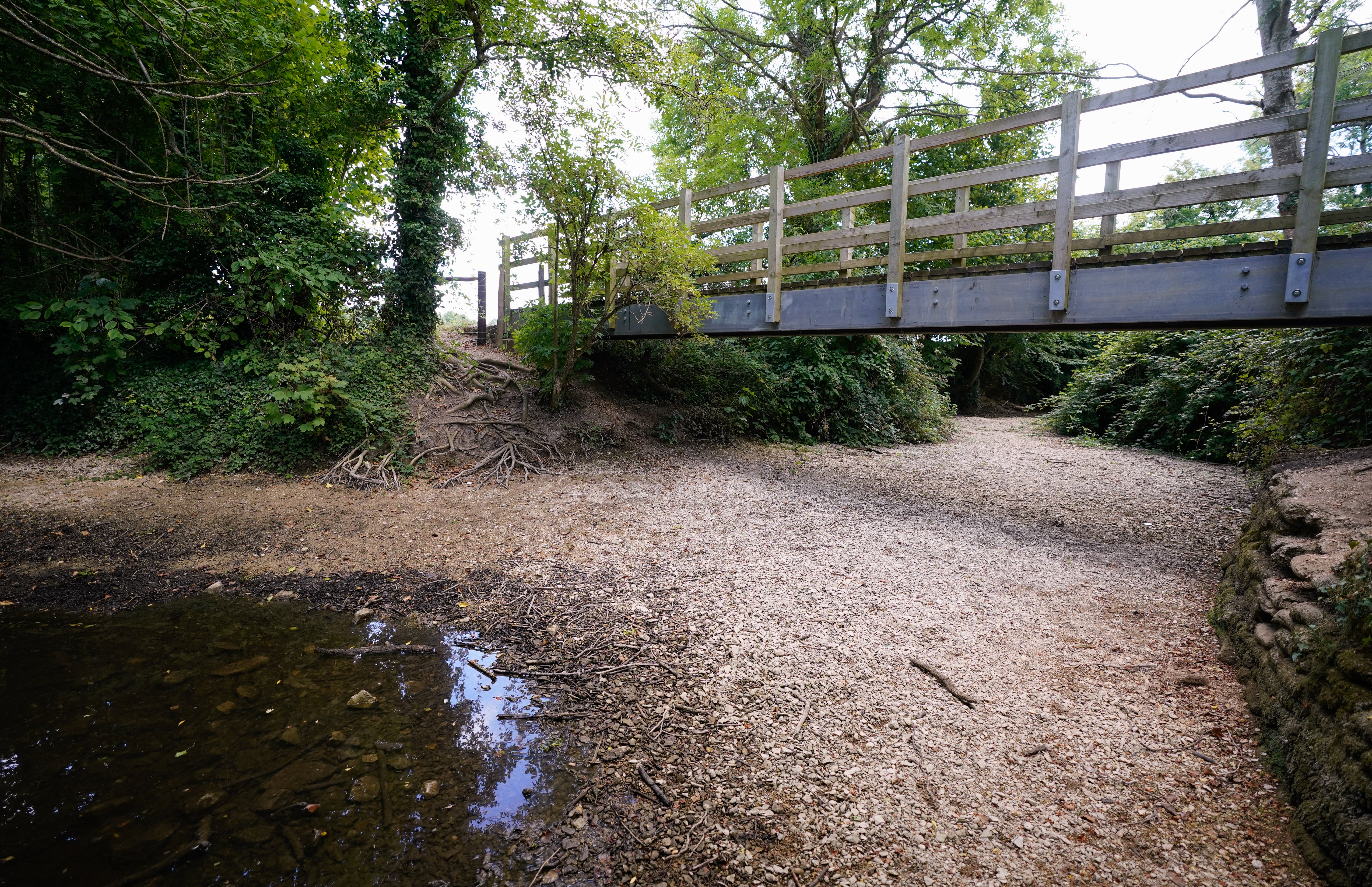 The dried up riverbed of the River Thames near to Somerford Keynes in Gloucestershire (Andrew Matthews/PA)