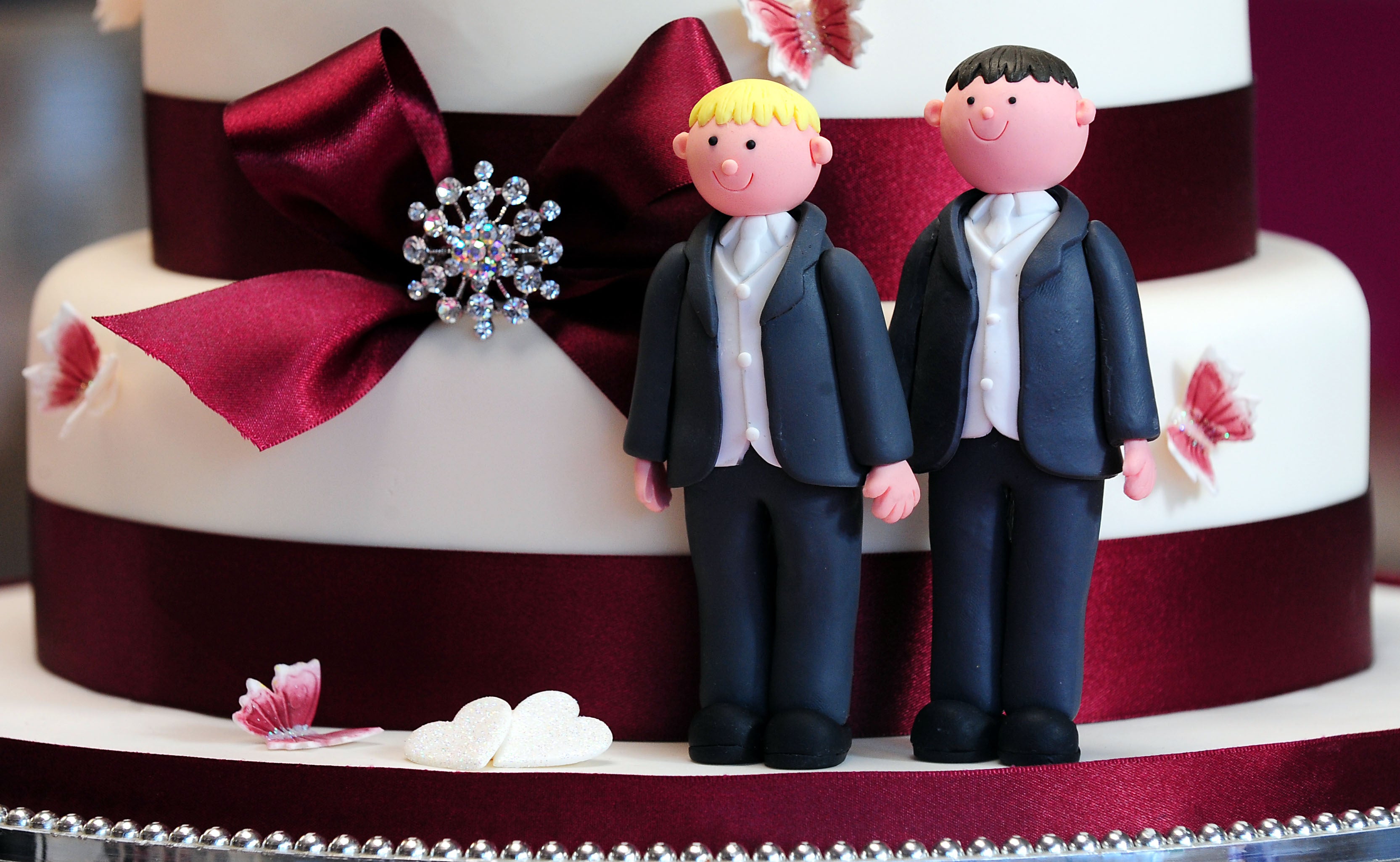 Cake decorations on a wedding cake (Rui Vieira/PA)