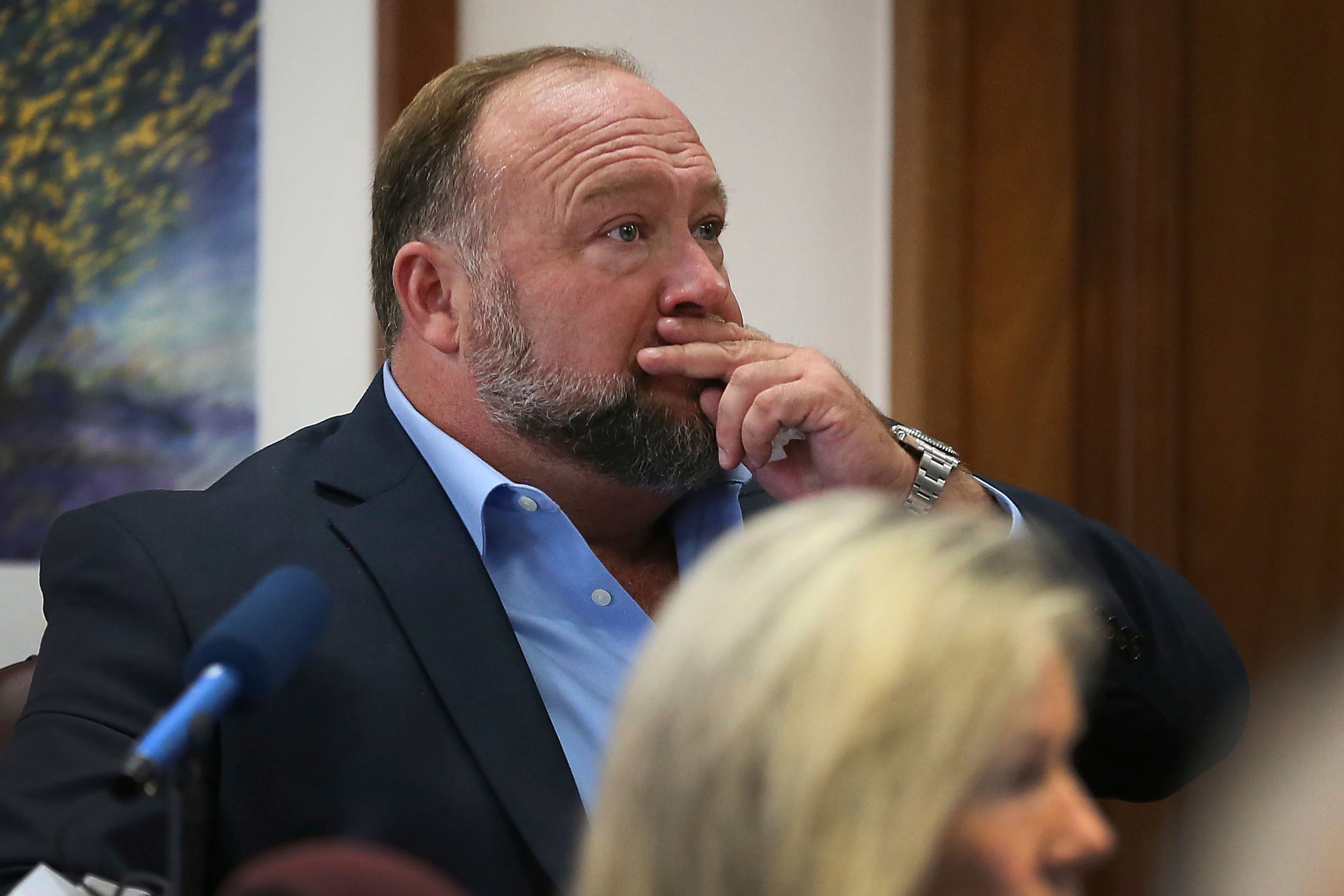 Alex Jones on the stand at his trial at the Travis County Courthouse in Austin on 3 August