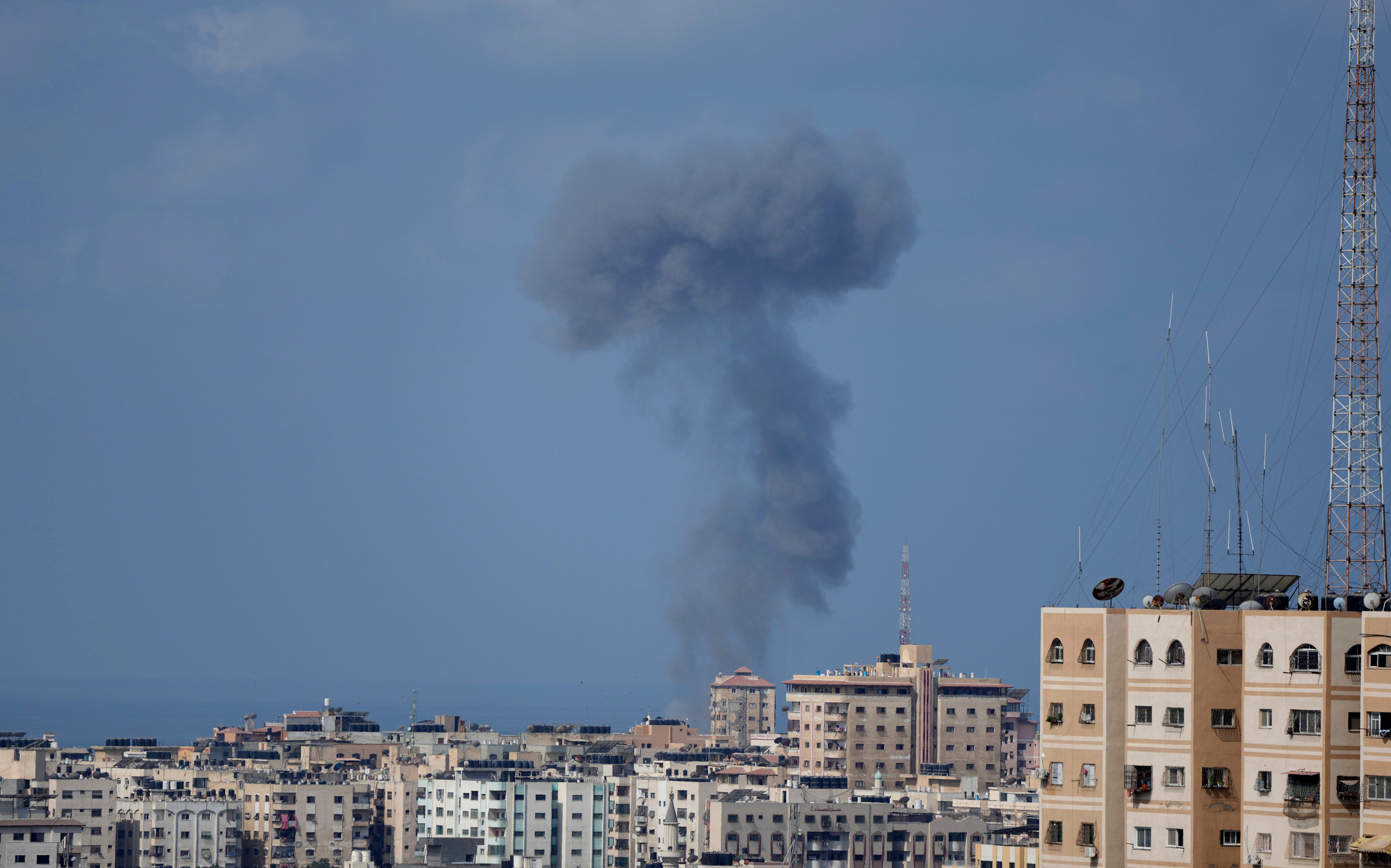 Smoke rises following Israeli airstrikes on a building in Gaza City on Saturday