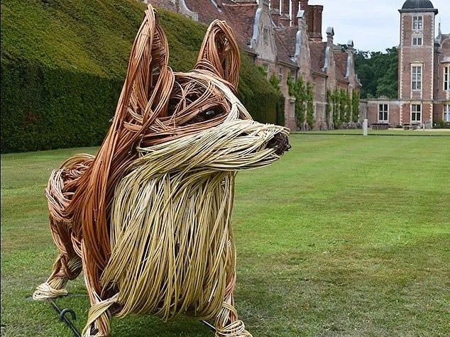 One of the seven wicker corgi sculptures