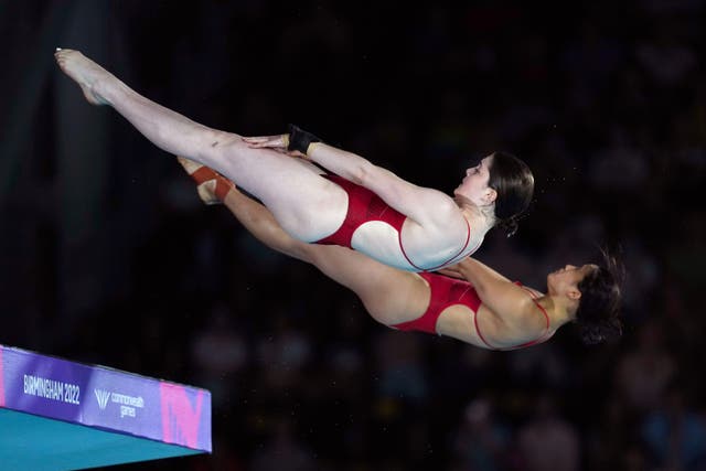 Andrea Spendolini-Sirieix, left, and Eden Cheng on their way to a silver medal (David Davies/PA)