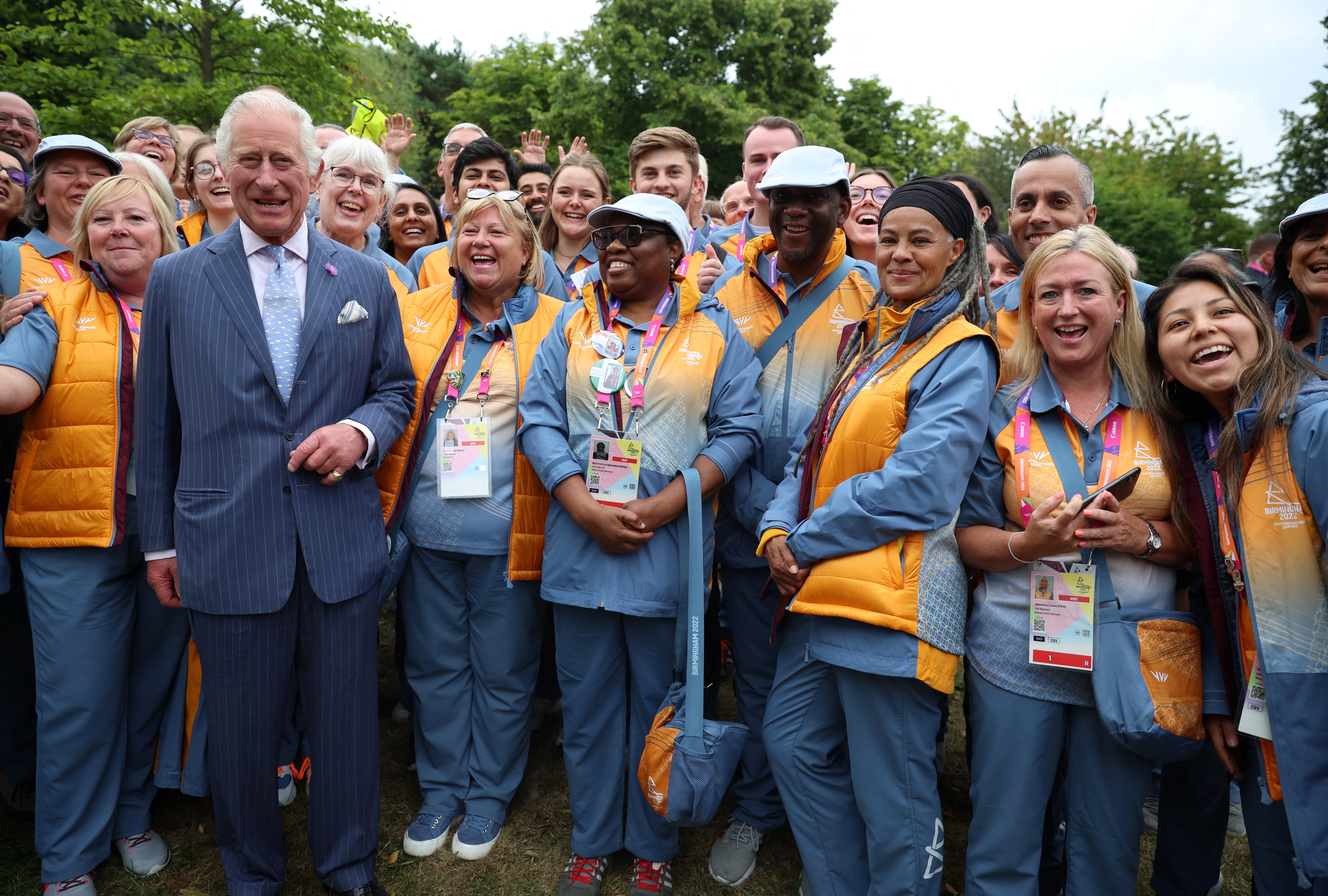 Commonwealth volunteers meet the Prince of Wales on the day of the opening ceremony (Phil Noble/PA)