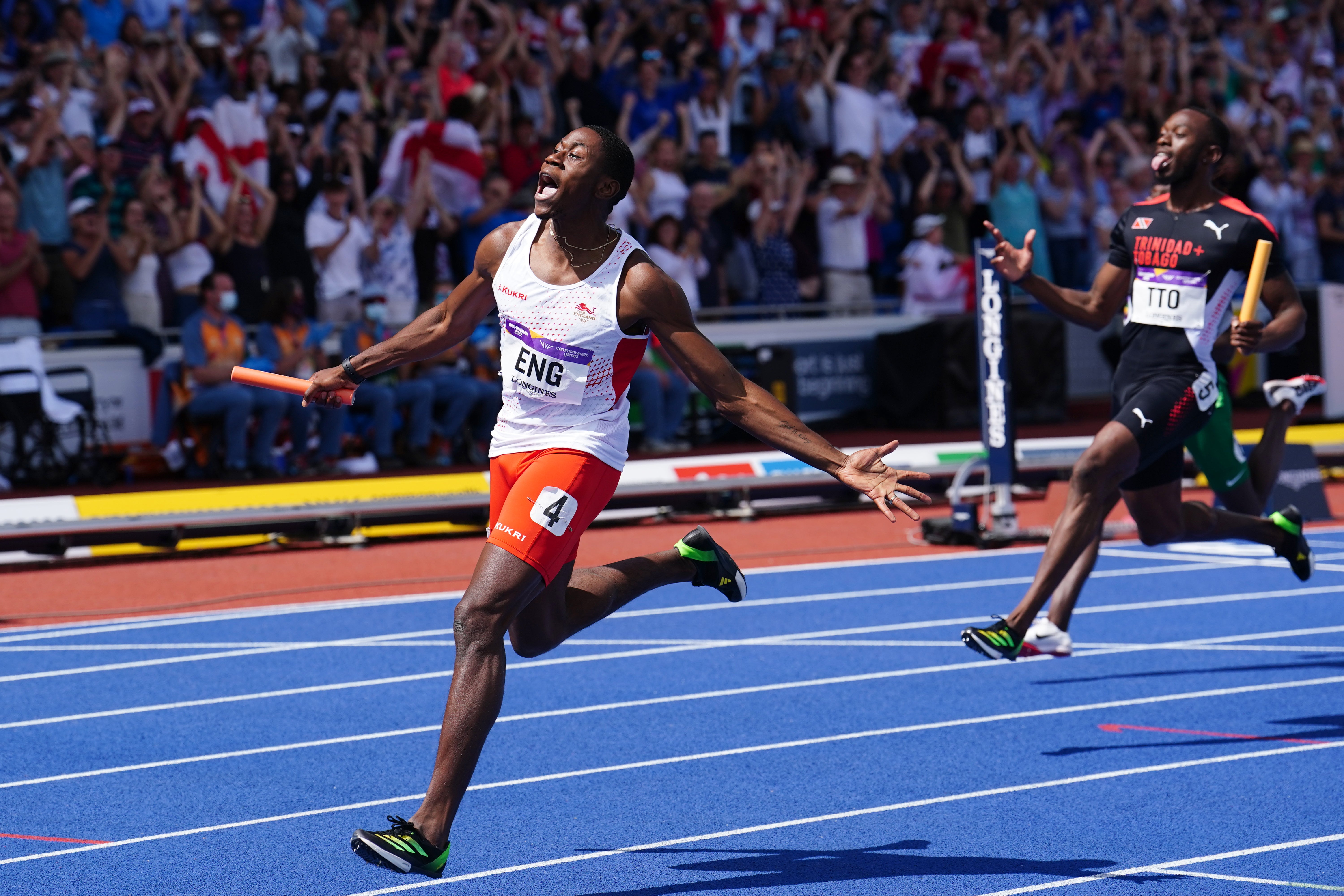 Ojie Edoburun celebrates after anchoring England to victory in the men’s 4x100m relay (Martin Rickett/PA)