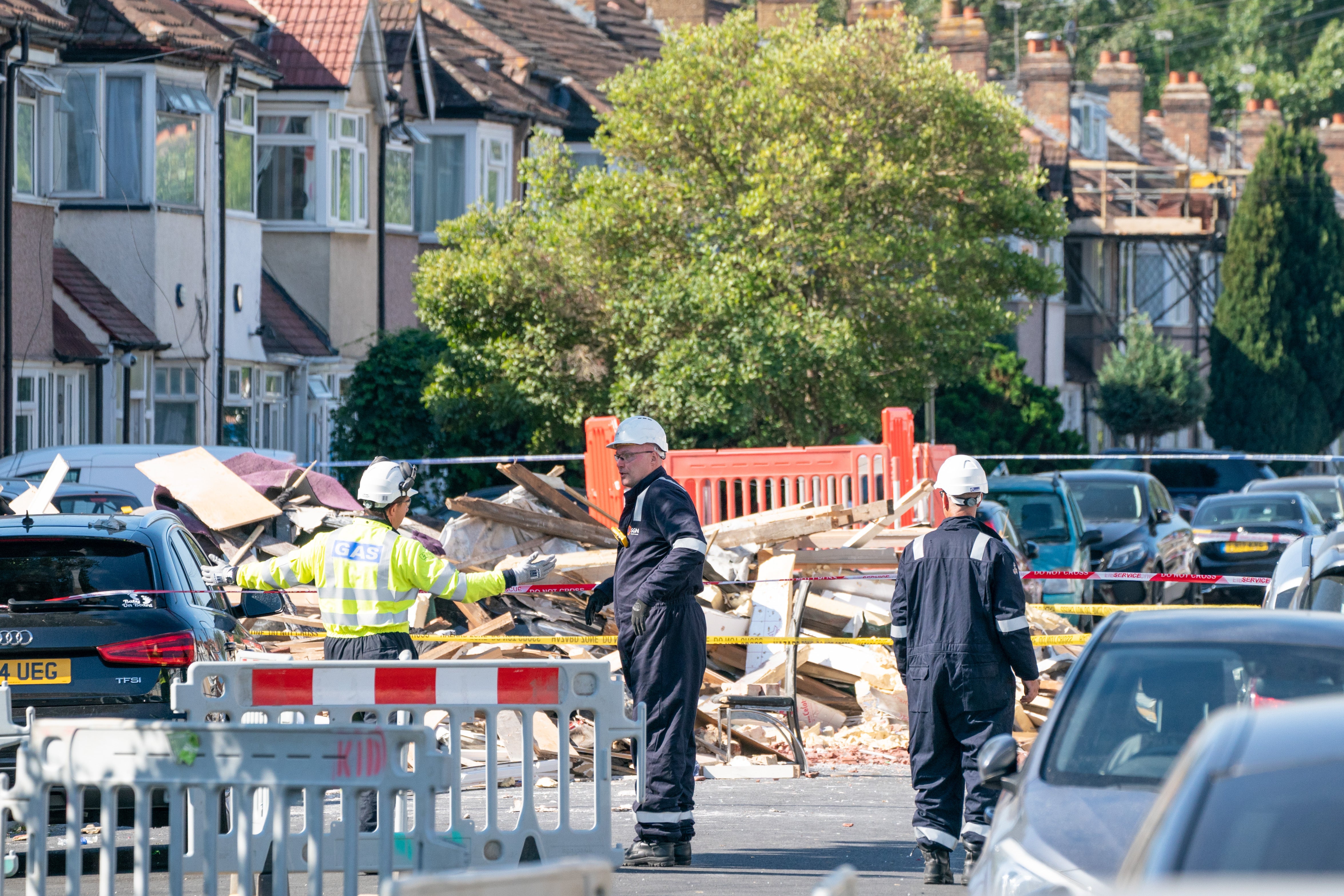 Engineers at the scene of an explosion on Galpin’s Road in Thornton Heath, south London (Dominic Lipinski/PA)