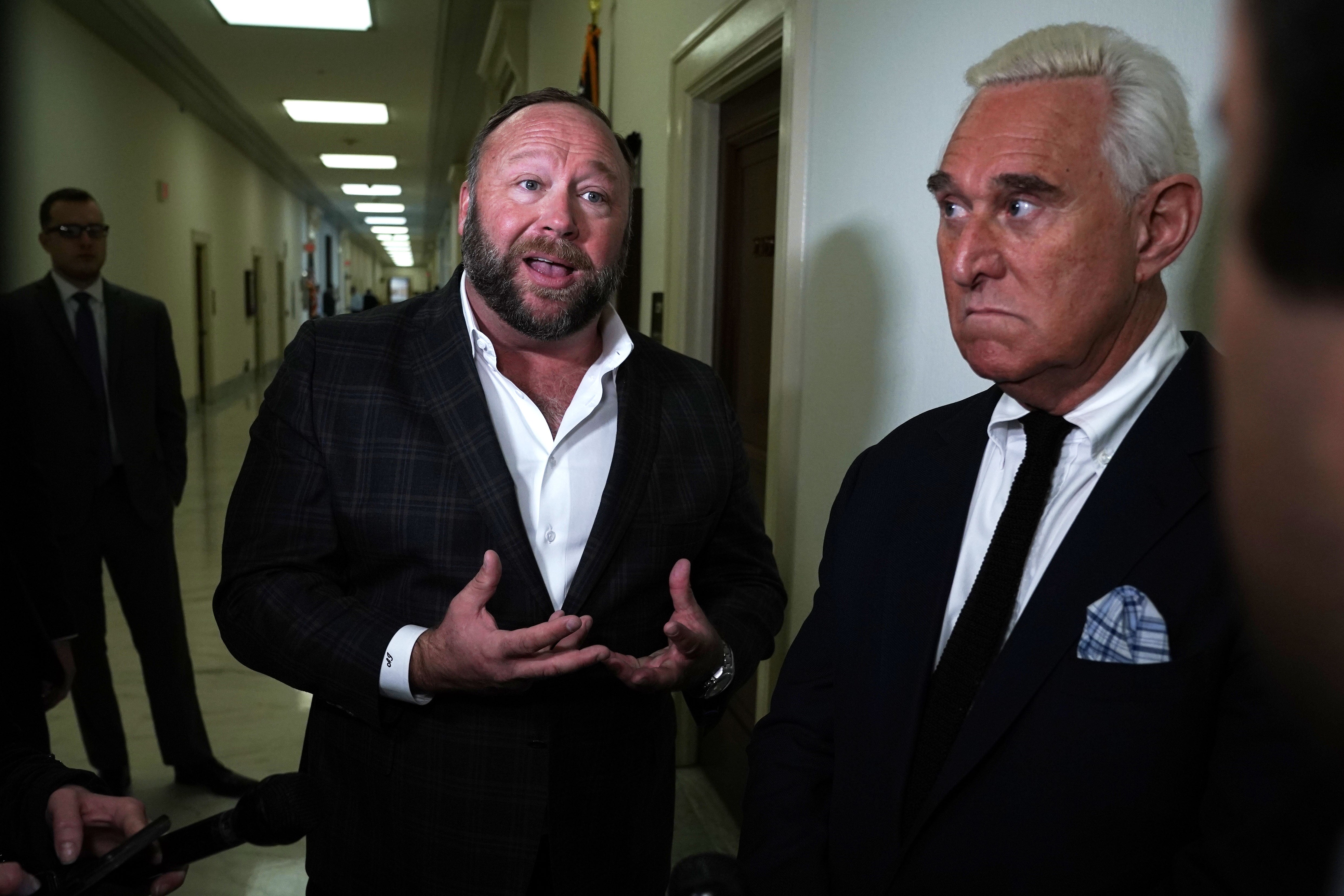 Alex Jones and Roger Stone were among those pleading the Fifth. They are pictured together in Washington DC in 2018