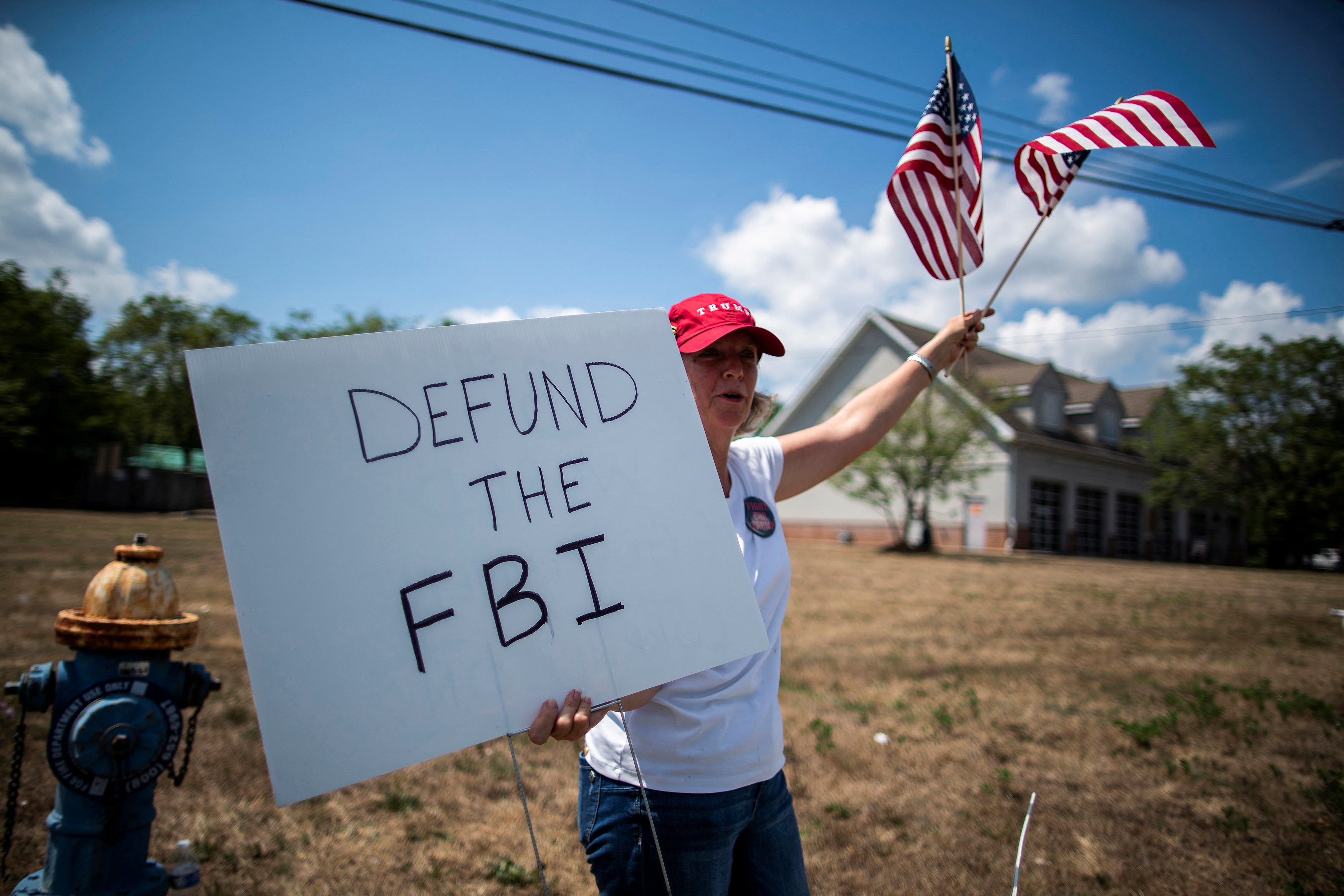 A Trump supporter protest near the Trump National Golf Club in Bedminster, New Jersey