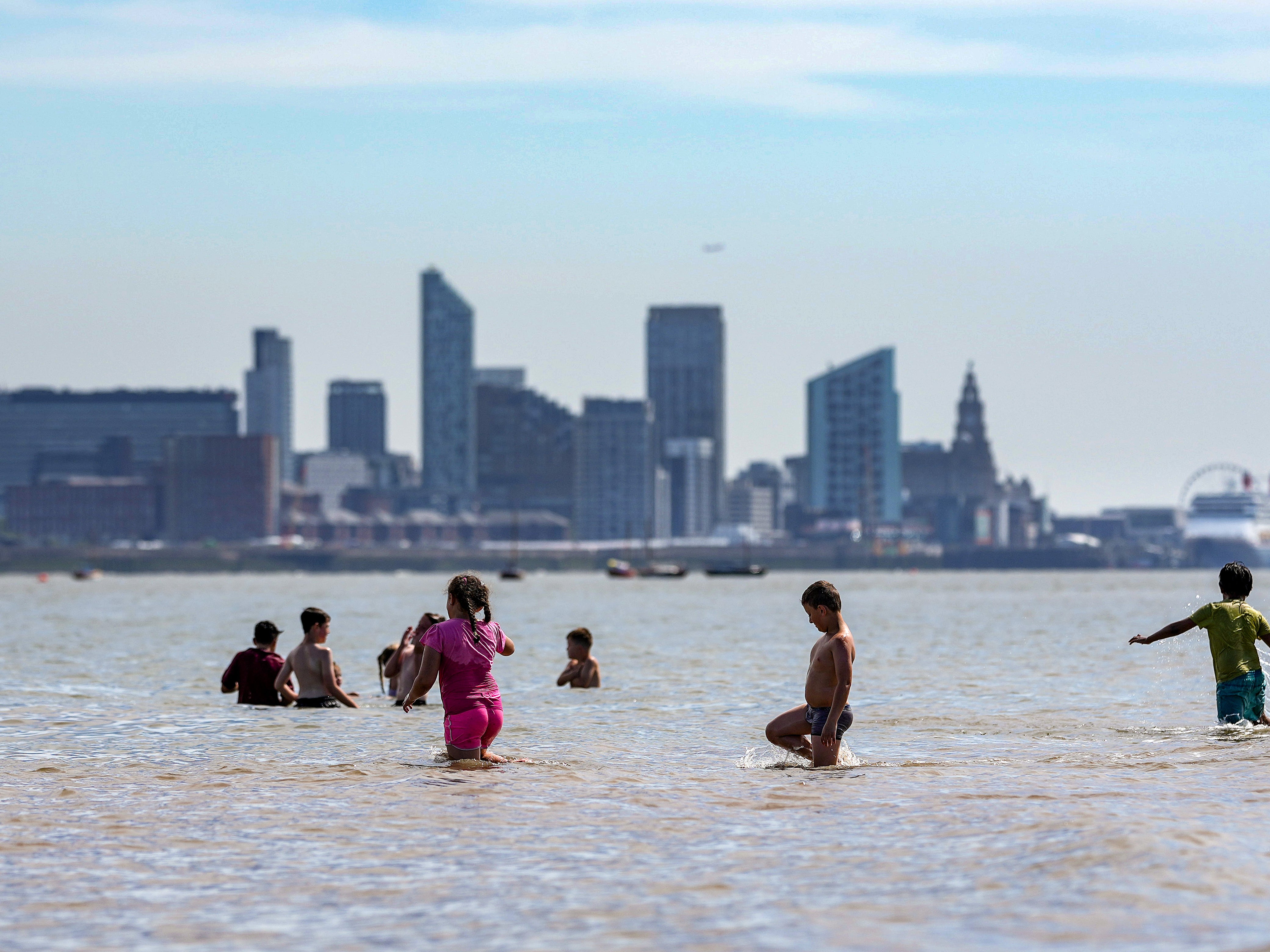 Britons flocked to the beach for the warm weather on Thursday