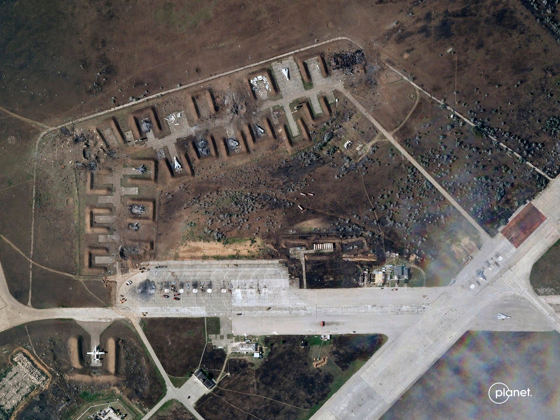 This satellite image shows destroyed Russian aircraft at Saki airbase after an explosion