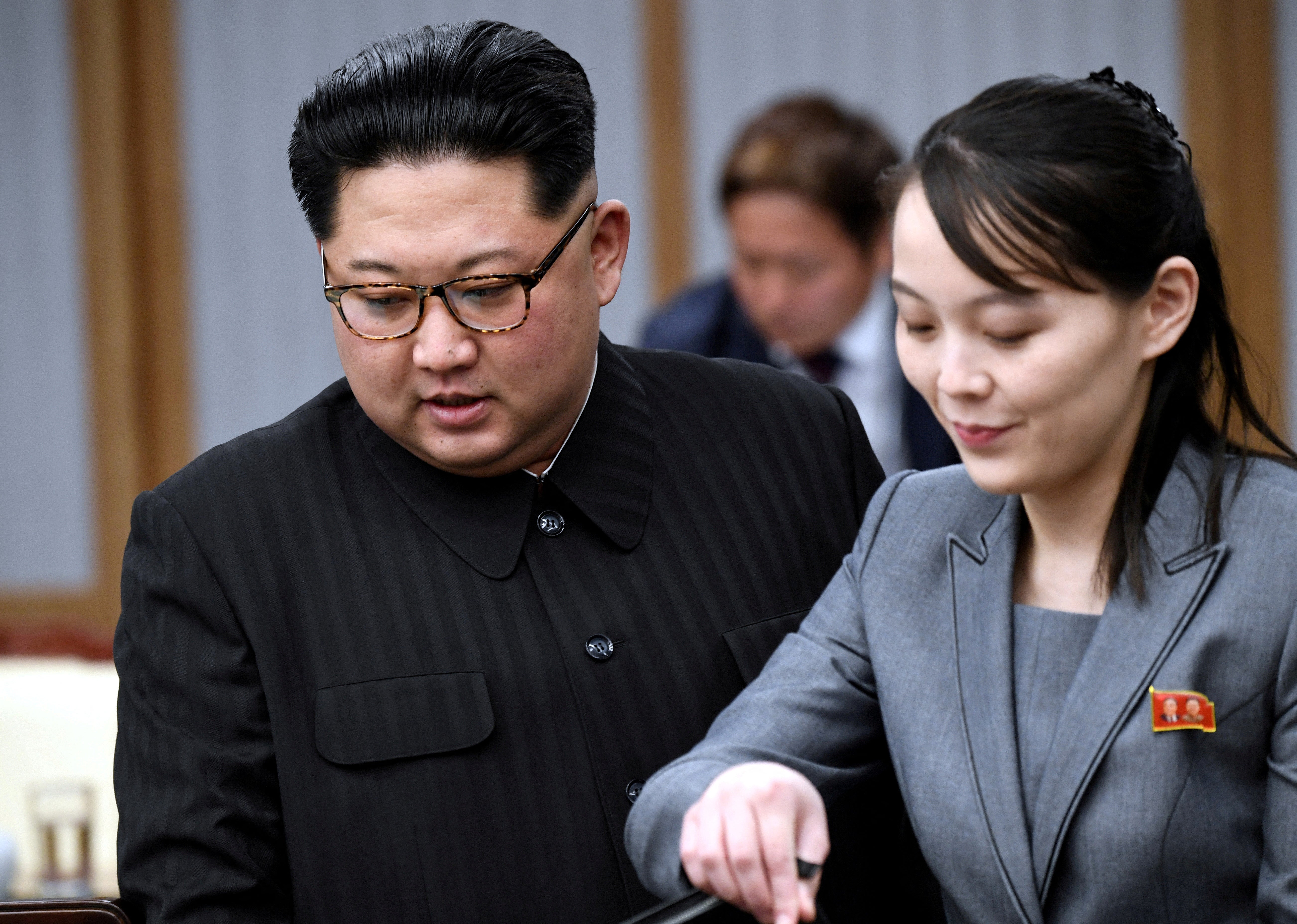 North Korean leader Kim Jong Un and his sister Kim Yo Jong attend a meeting with South Korean president Moon Jae In at the truce village of Panmunjom inside the demilitarised zone separating the two nations on 27 April 2018