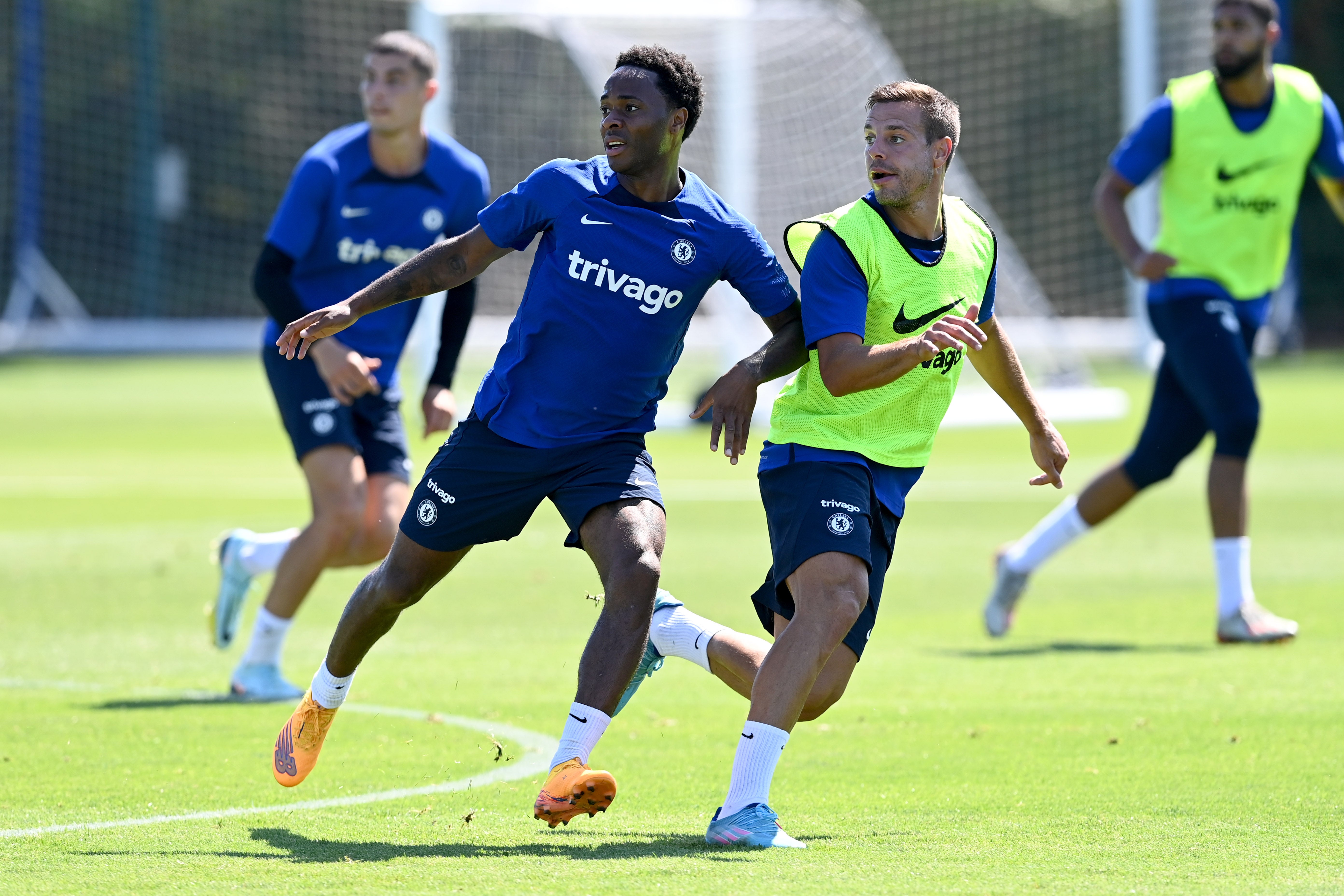 Raheem Sterling competes with Cesar Azpilicueta in Chelsea training