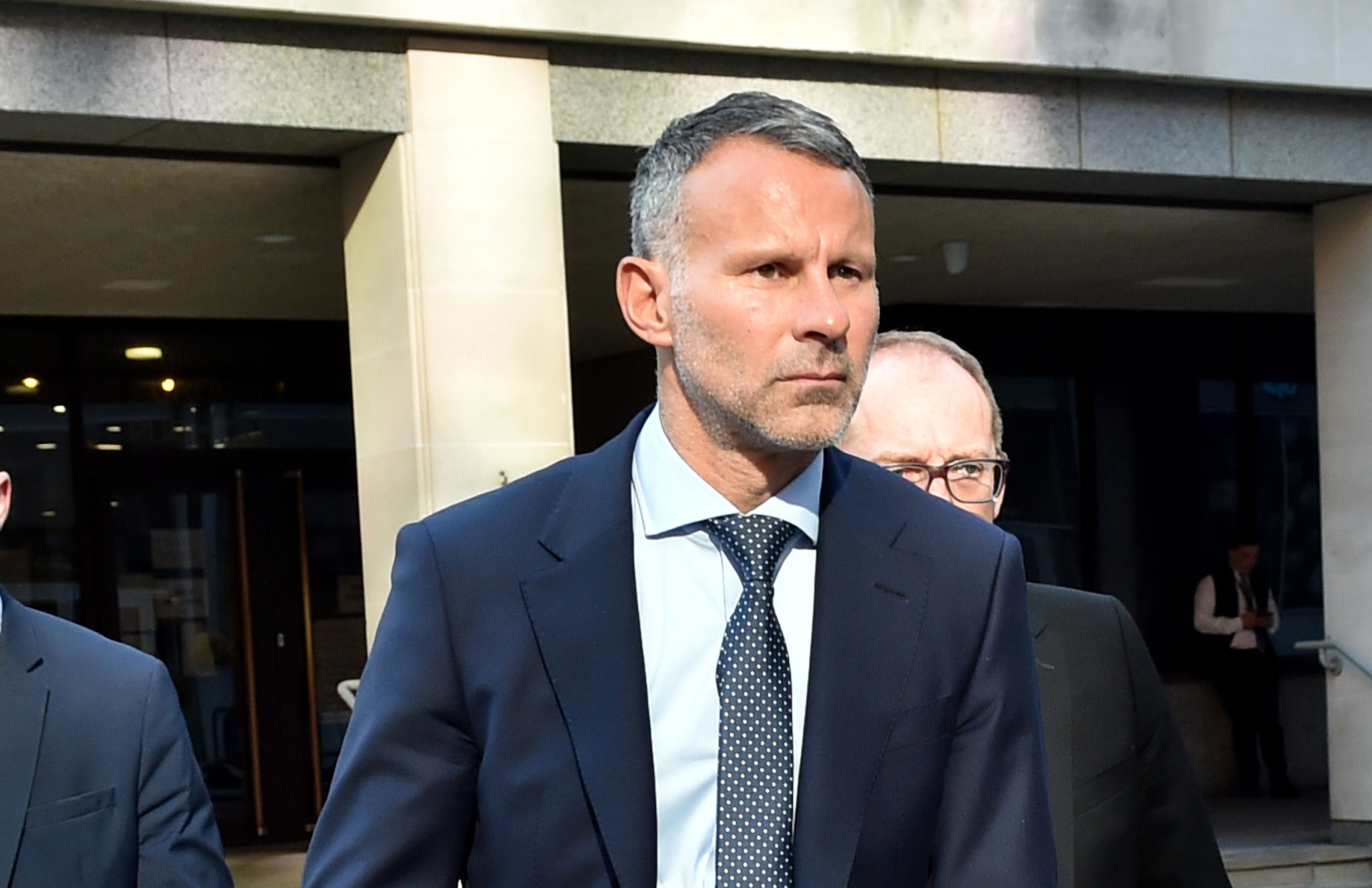 Former Manchester United footballer Ryan Giggs leaves Manchester Crown Court (Steven Allen/PA)