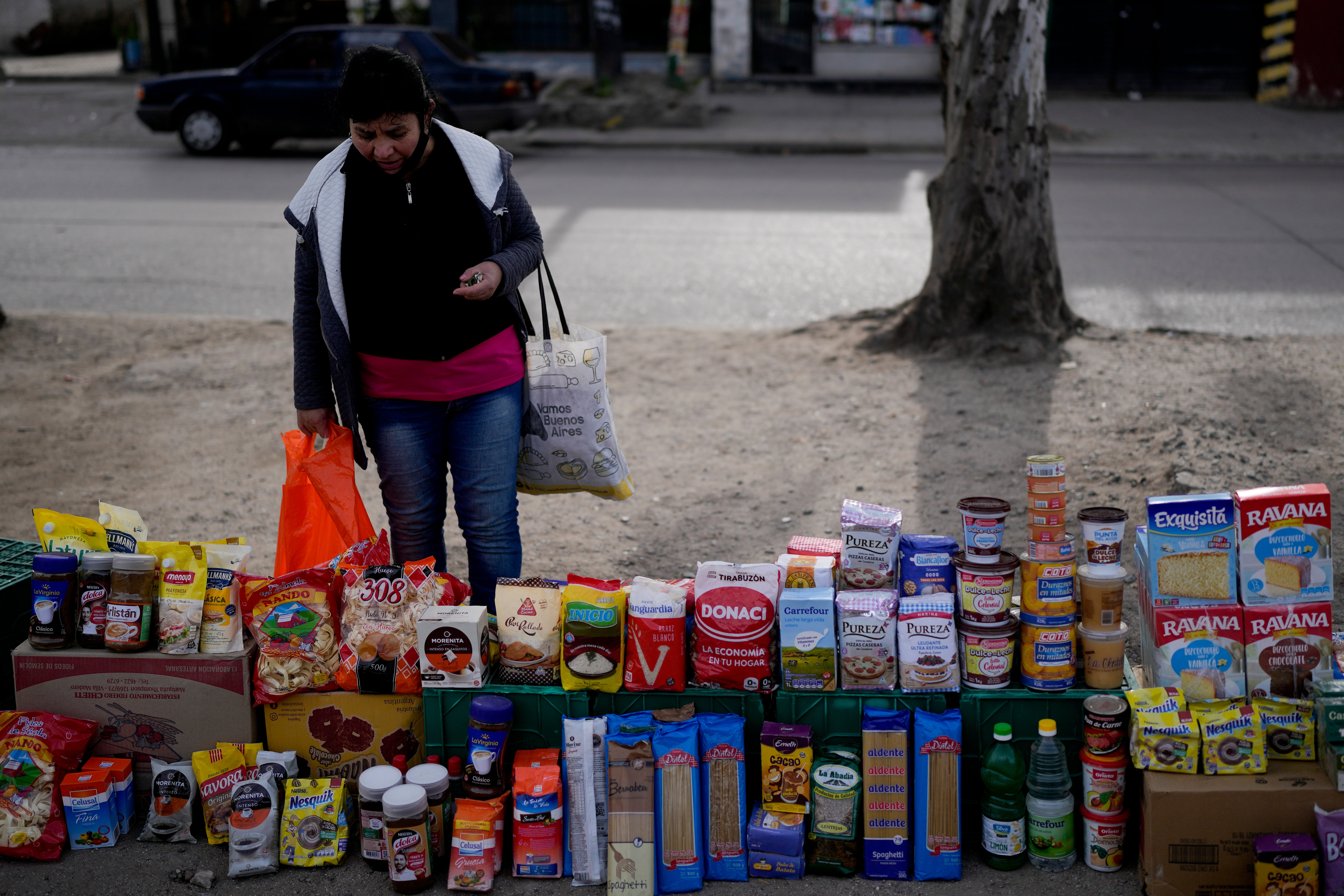 A woman in Argentina browses a market