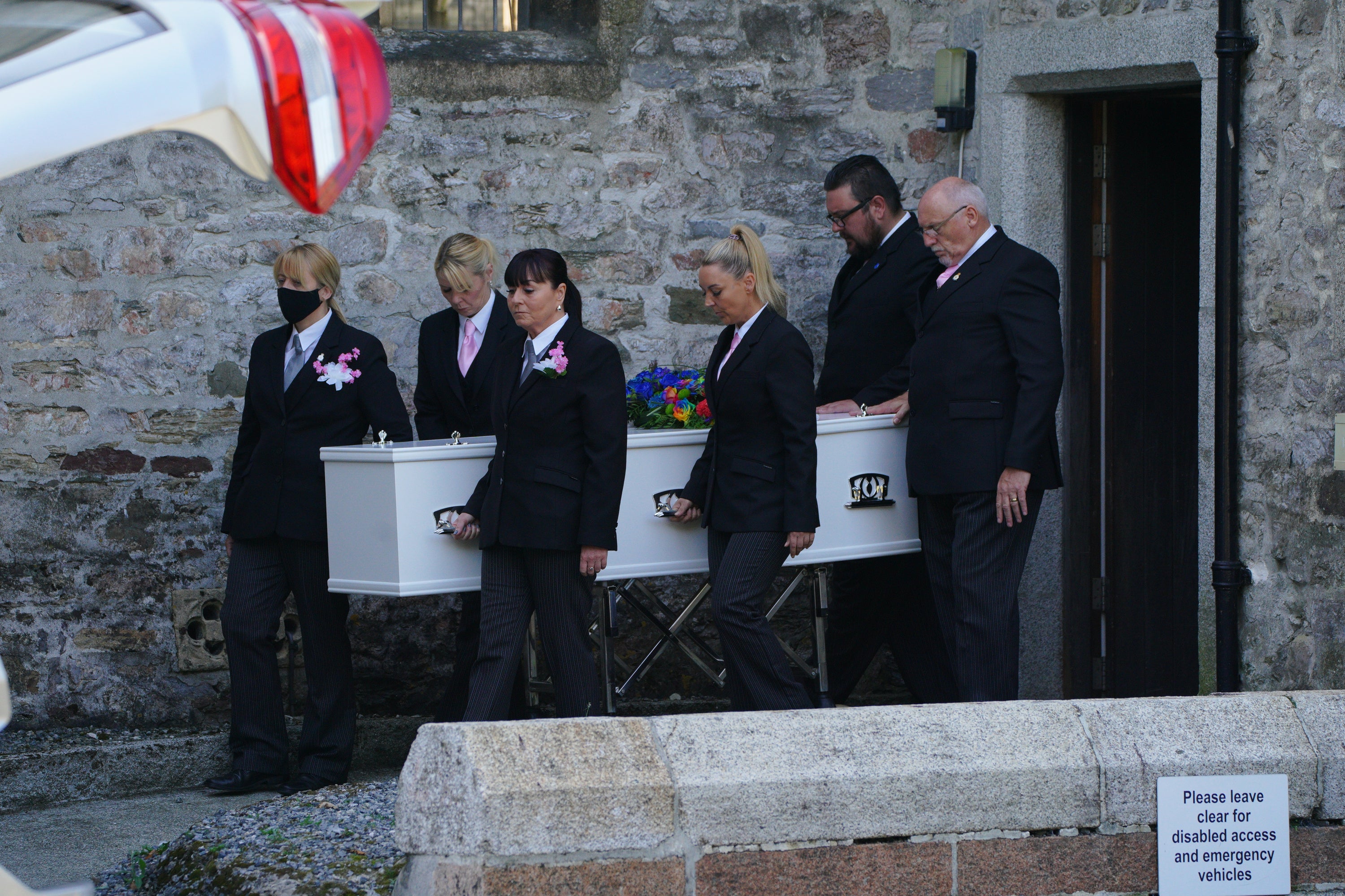 The cortege leaves the Church of St Andrews, Plymouth, following the funeral of three-year-old Sophie Martyn and her father Lee Martyn, 43, victims of the Plymouth shootings (PA)