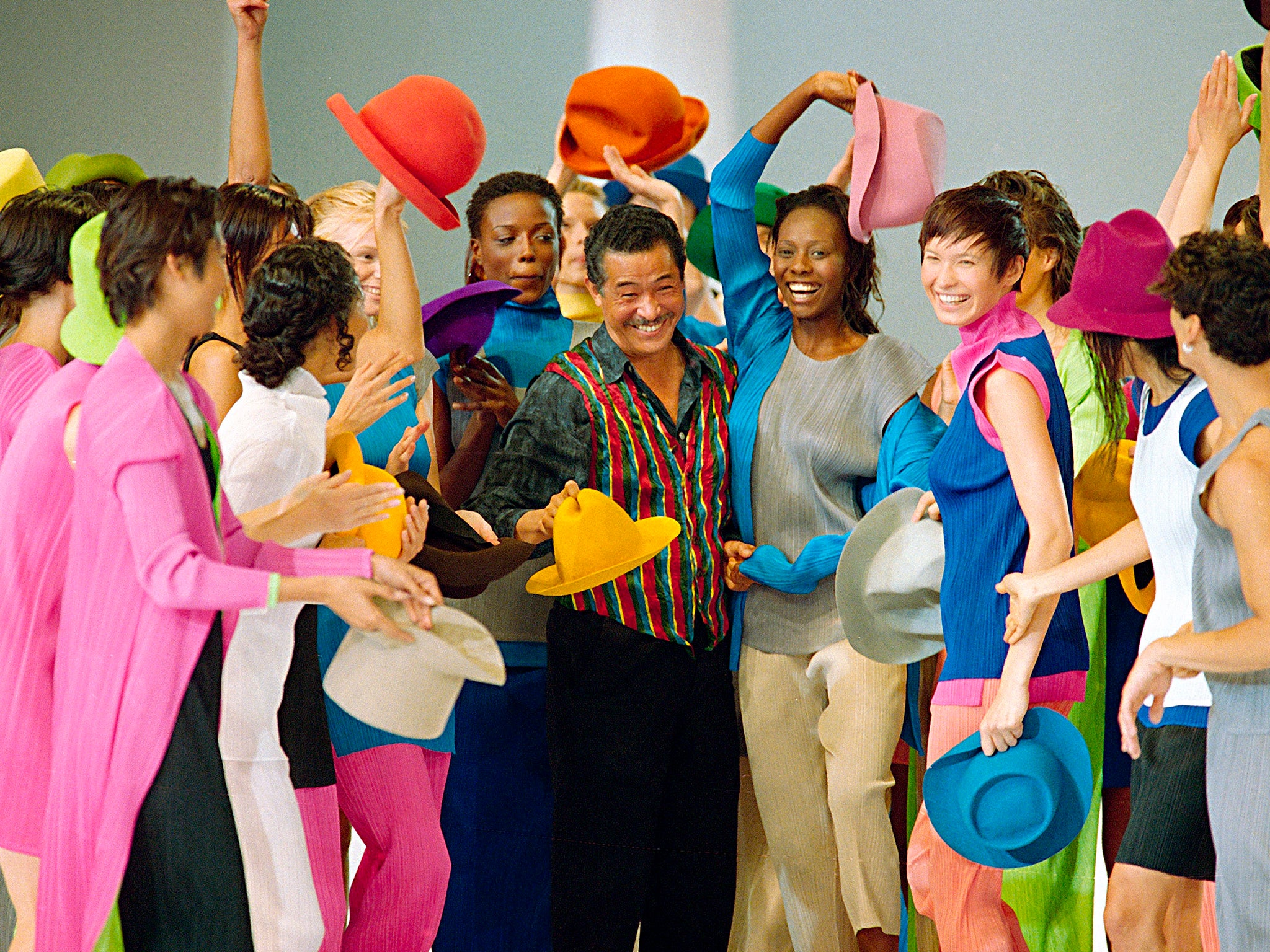 Surrounded by models in Paris after the presentation of his 1994 Spring-Summer ready-to-wear collection