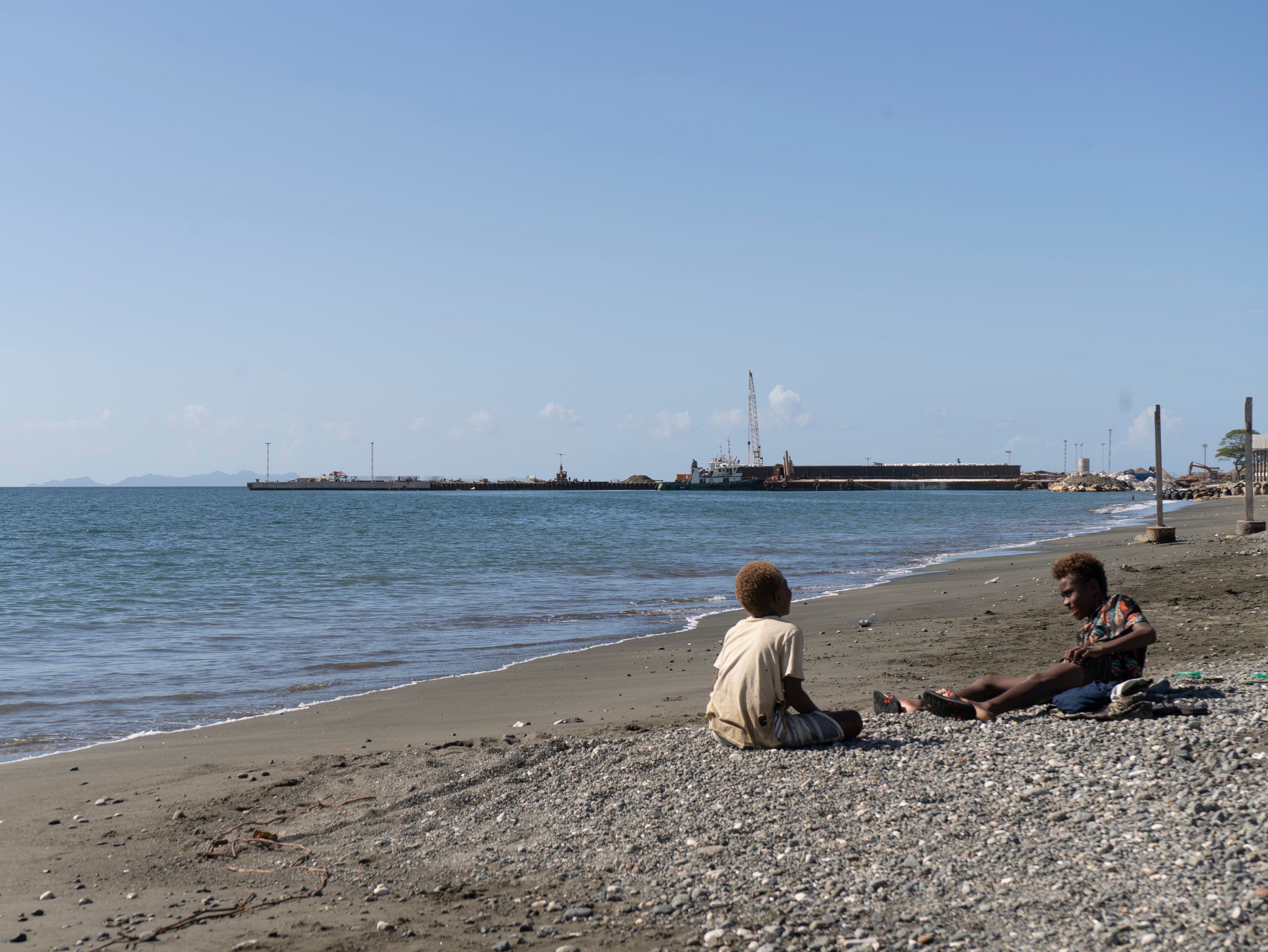 Boys play near Leroy Wharf, a port outside Honiara that some opposition leaders and experts think China could use as a de facto base