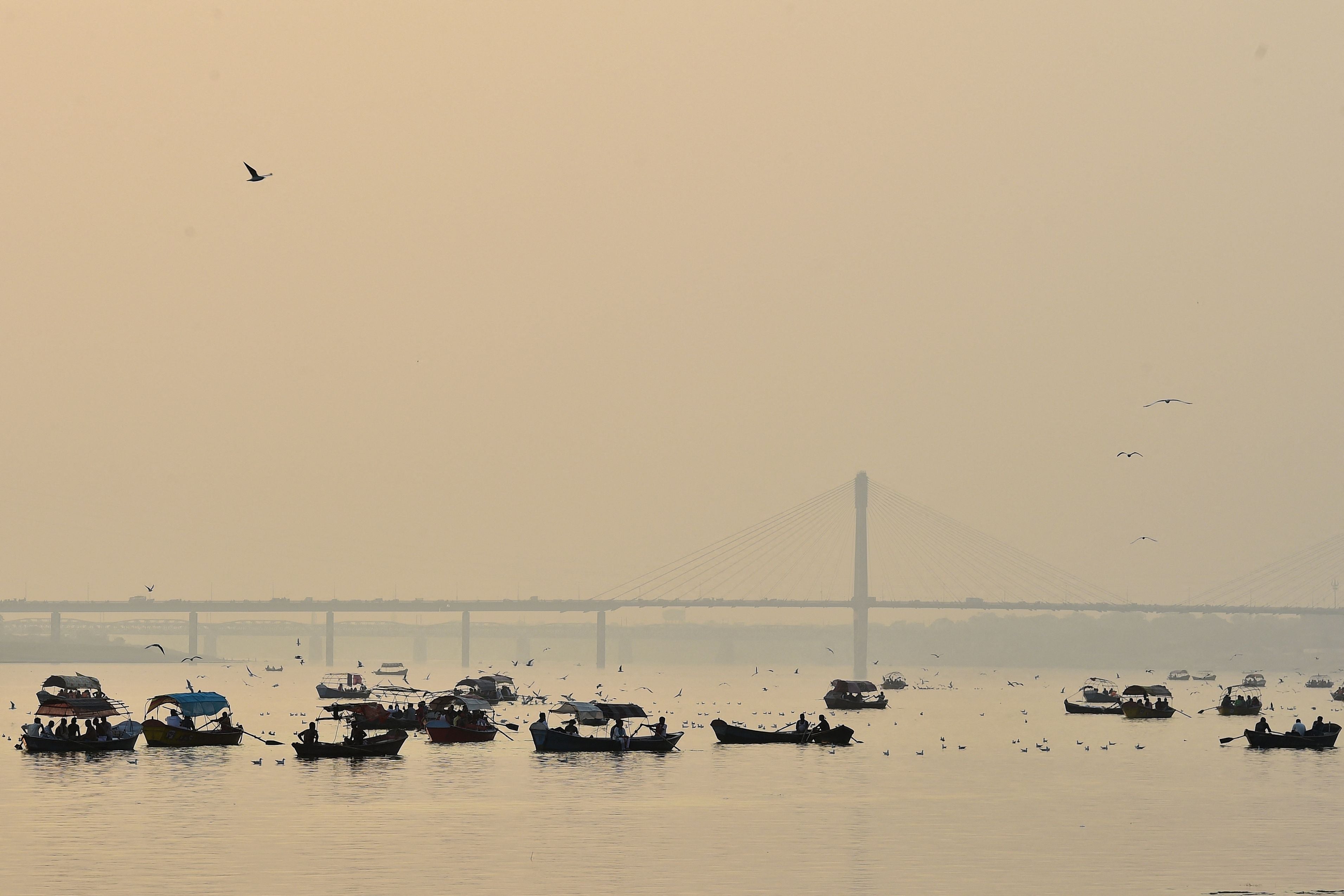 View of the heavy smoggy conditions at the Sangam, the confluence of the rivers Ganges, Yamuna and mythical Saraswati, in Allahabad