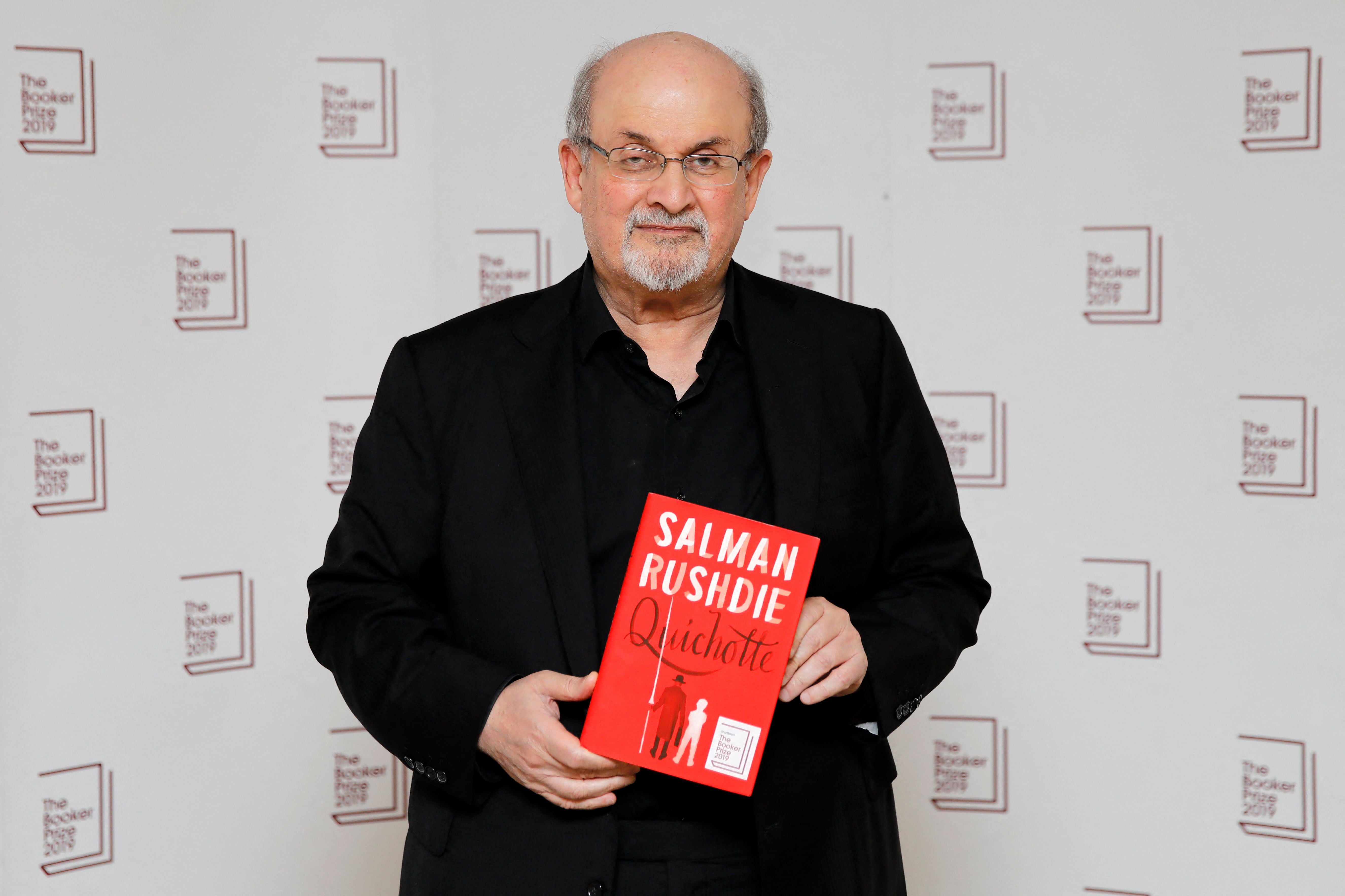 Salman Rushdie holds a copy of his Quichotte in 2019