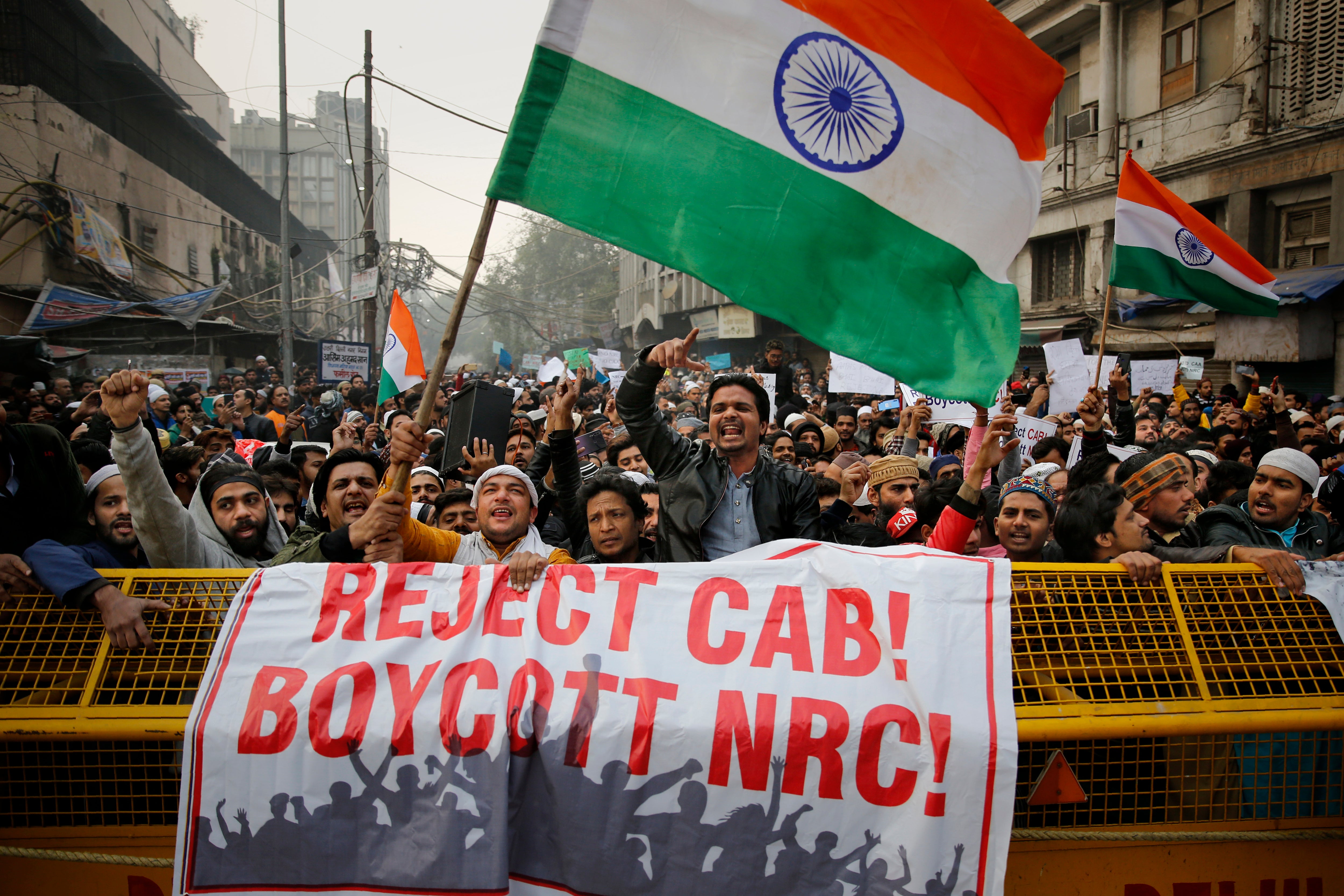 Protests in India as Modi enforces migration laws that exclude Muslims
