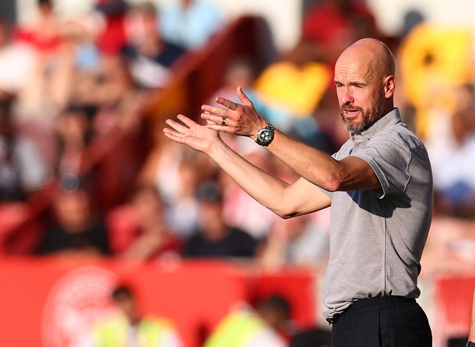 Erik ten Hag gestures on the touchline at Brentford