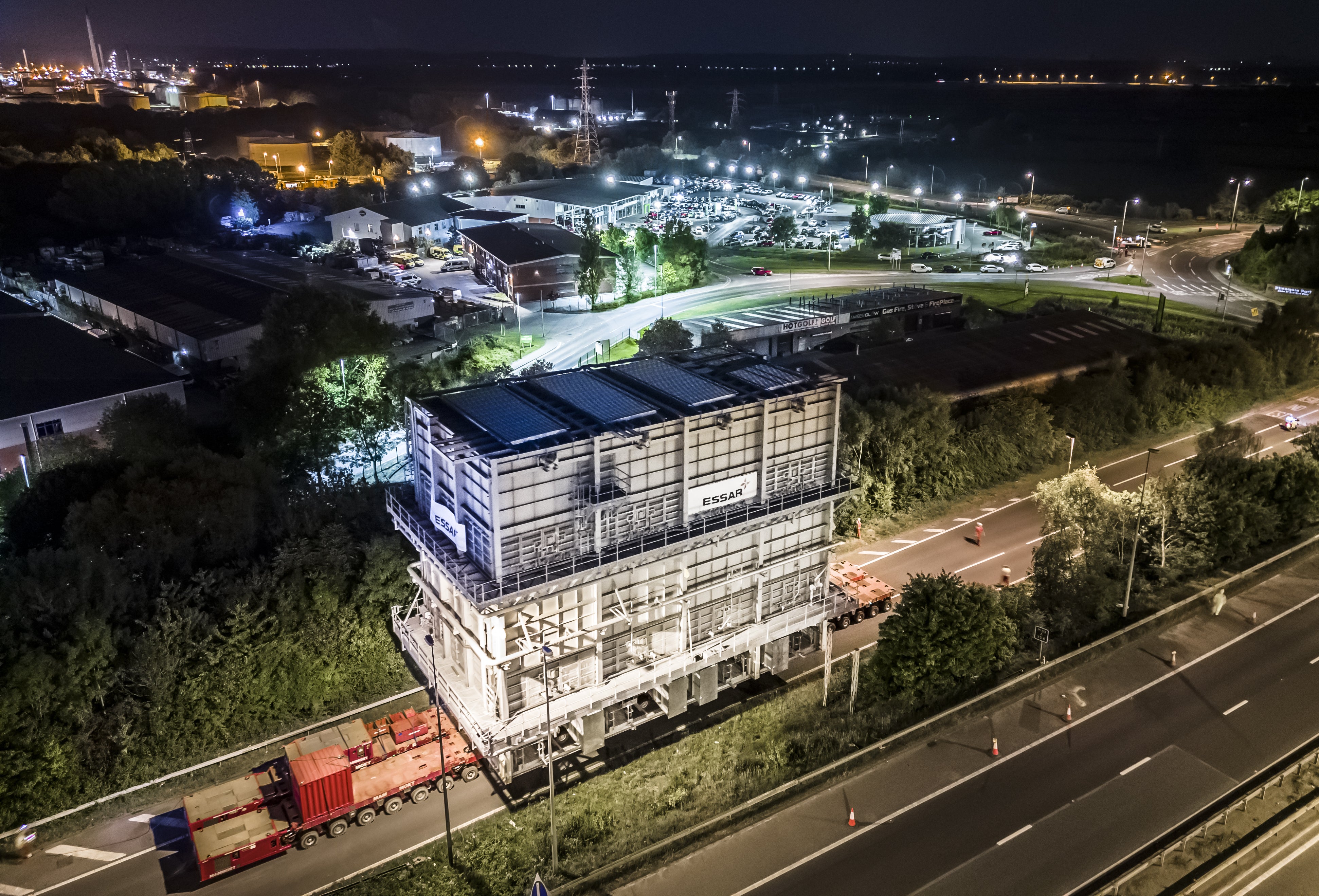 A part of a £45m furnace leaves the motorway after travelling along the M53 heading to Essar’s Stanlow refinery (Danny Lawson/PA)