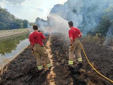 Enfield fire: 100 firefighters tackle blaze in grass near north London school