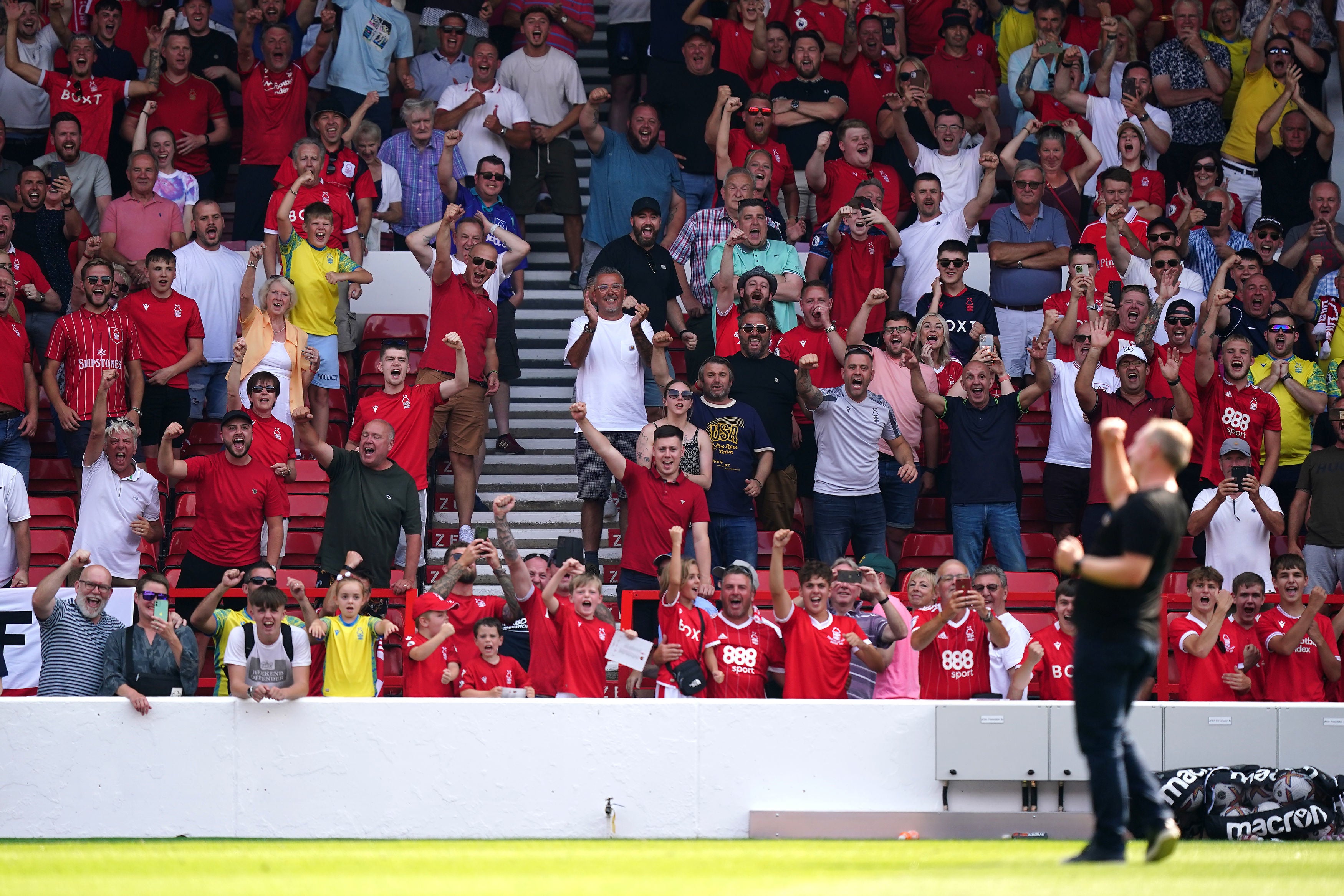 Nottingham Forest manager Steve Cooper celebrates in front of the fans after the final whistle