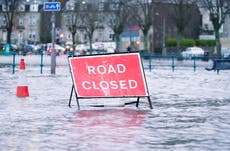 Storm Claudio news – live: Trains cancelled as high winds cause travel disruption